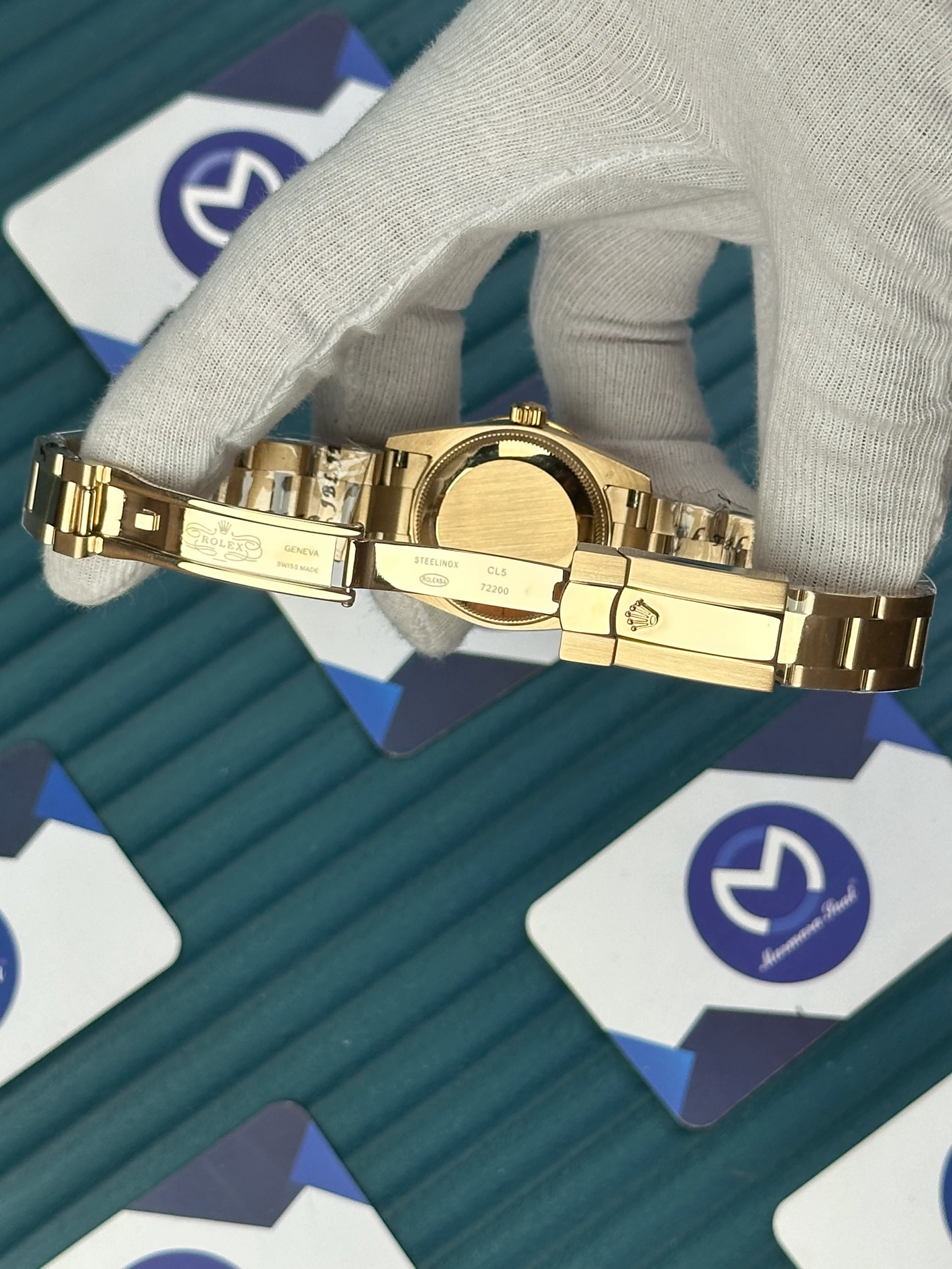 ROLEX 31 MM DATEJUST BLUE DIAL DIAMOND INDEX GOLD OYSTER 