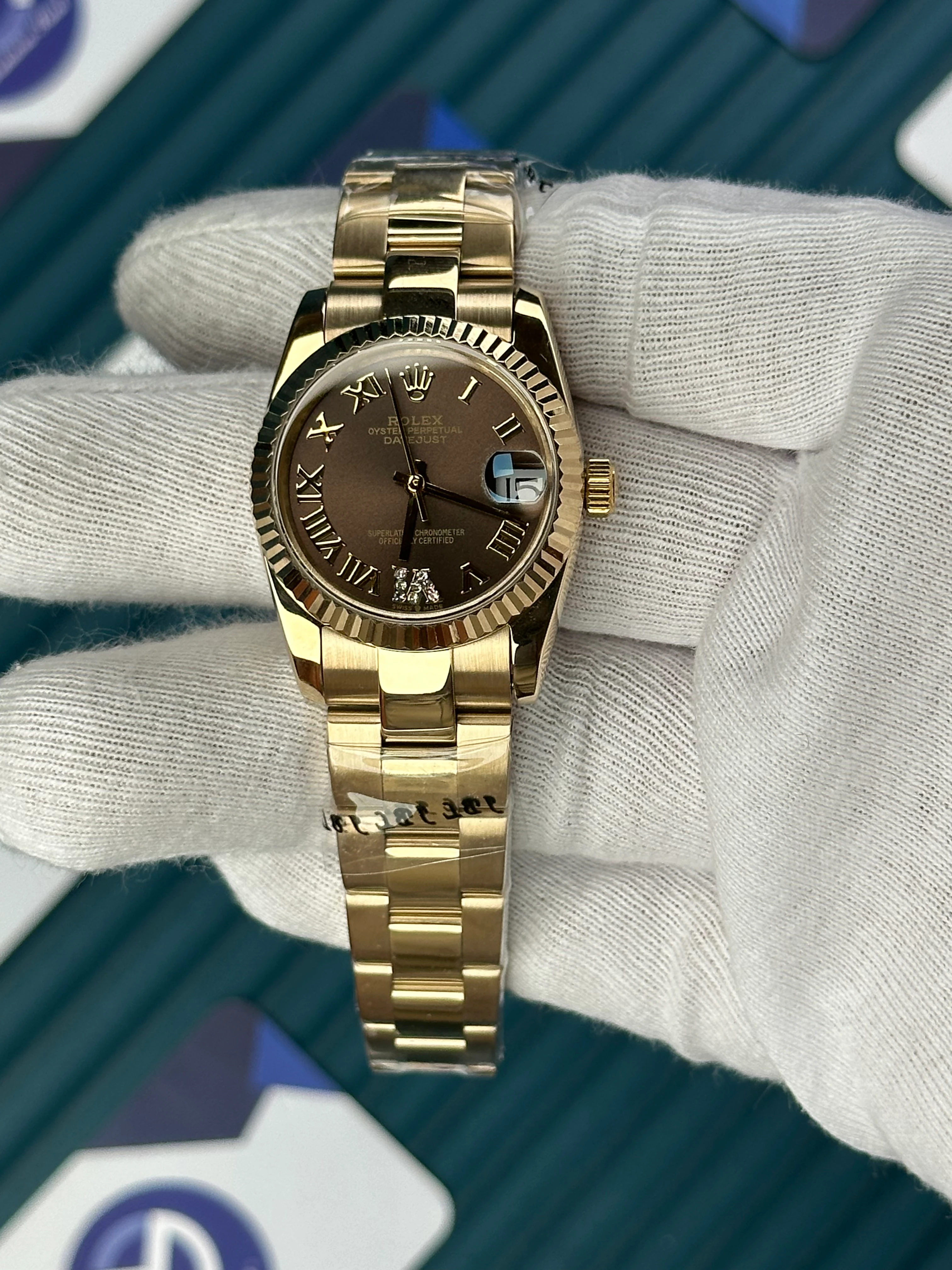 ROLEX 31 MM DATEJUST BROWN DIAL ROMA INDEX GOLD OYSTER 