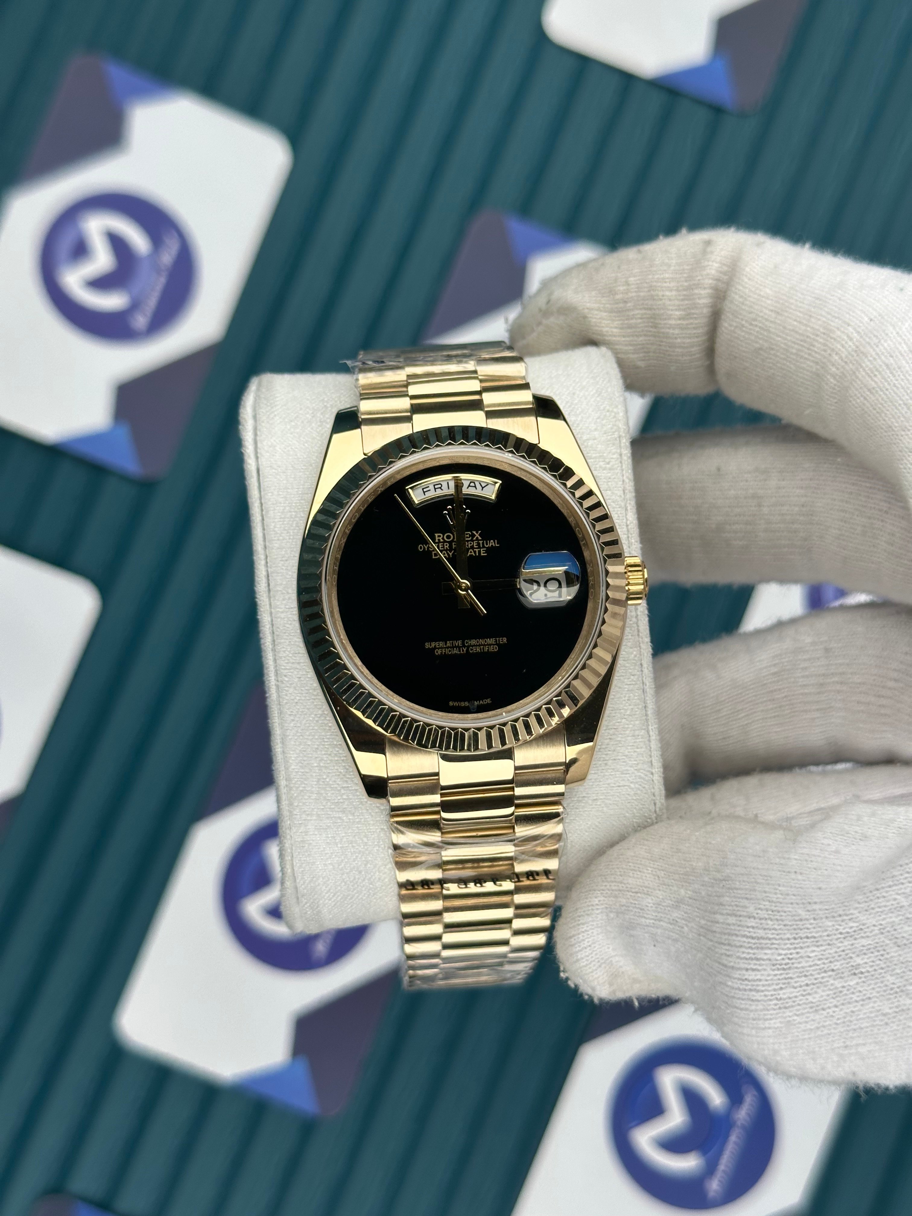 ROLEX DAY-DATE BLACK DIAL GOLD PRESIDENT