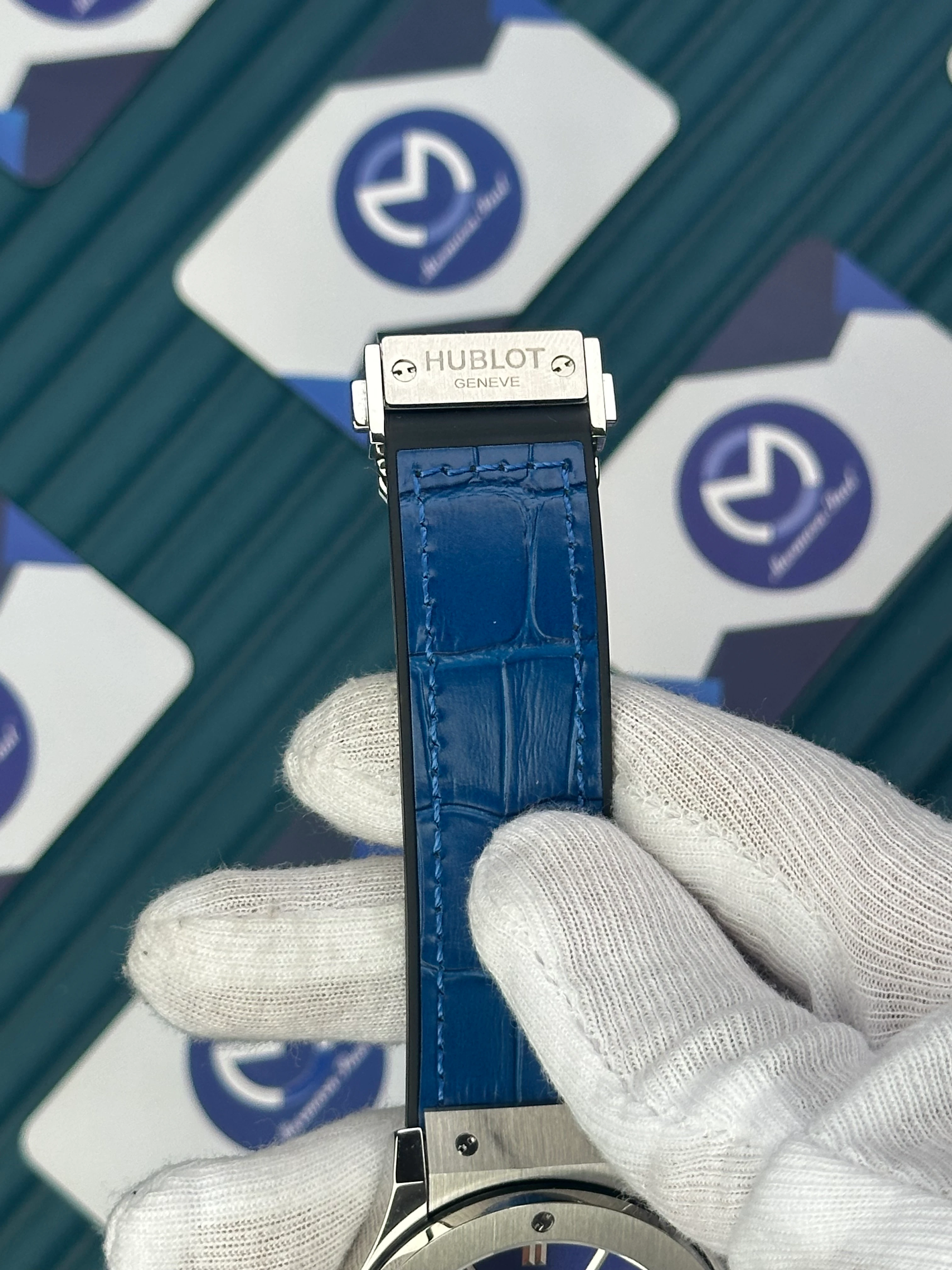 HUBLOT GENEVE AUTOMATIC VENDOME BLUE DIAL SILVER CASE BLUE LEATHER CORD 