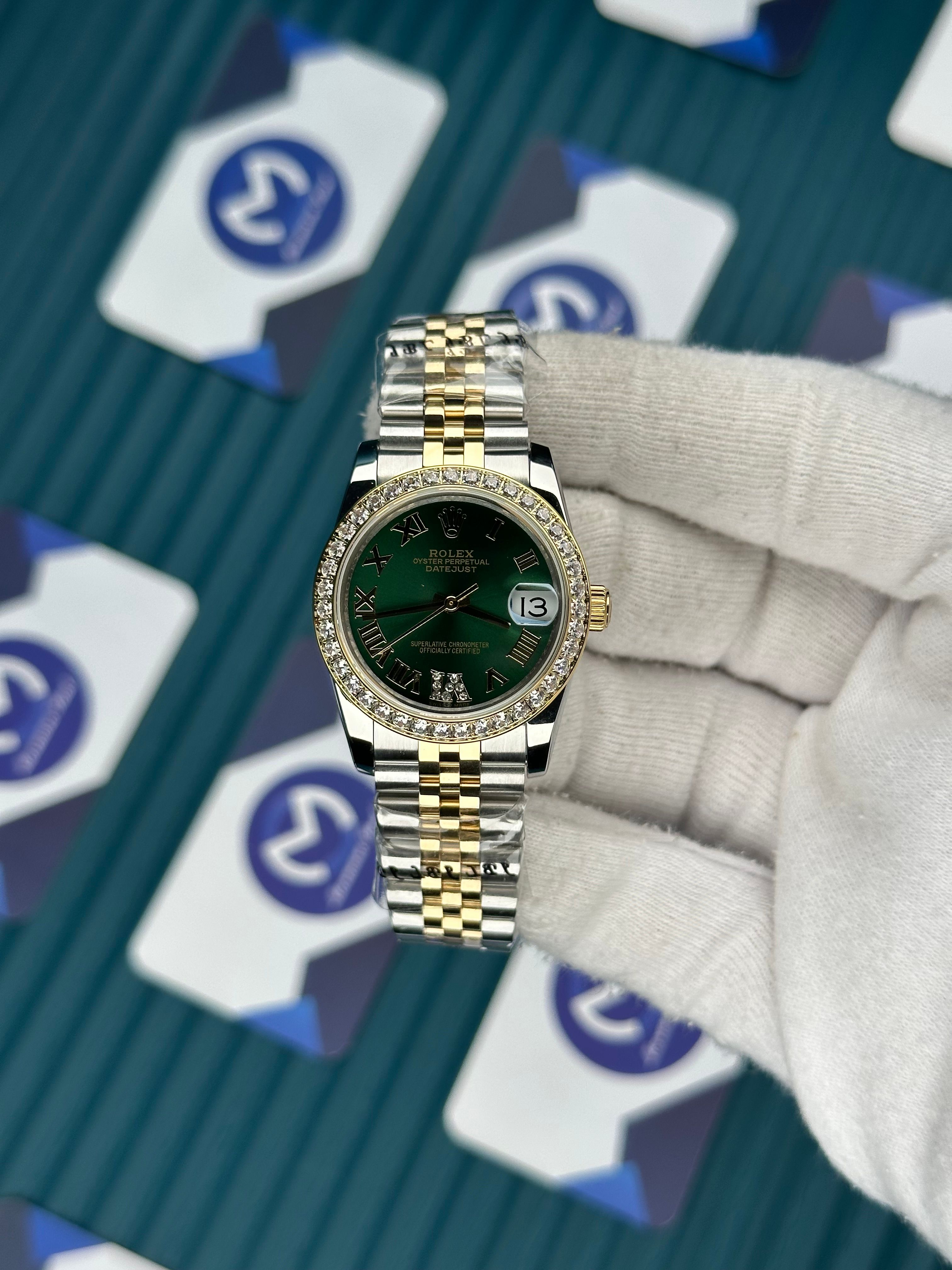 ROLEX 31 YEŞİL KADRAN ROMA INDEX PIRLANTA BEZEL GOLD-SILVER JUBILEE