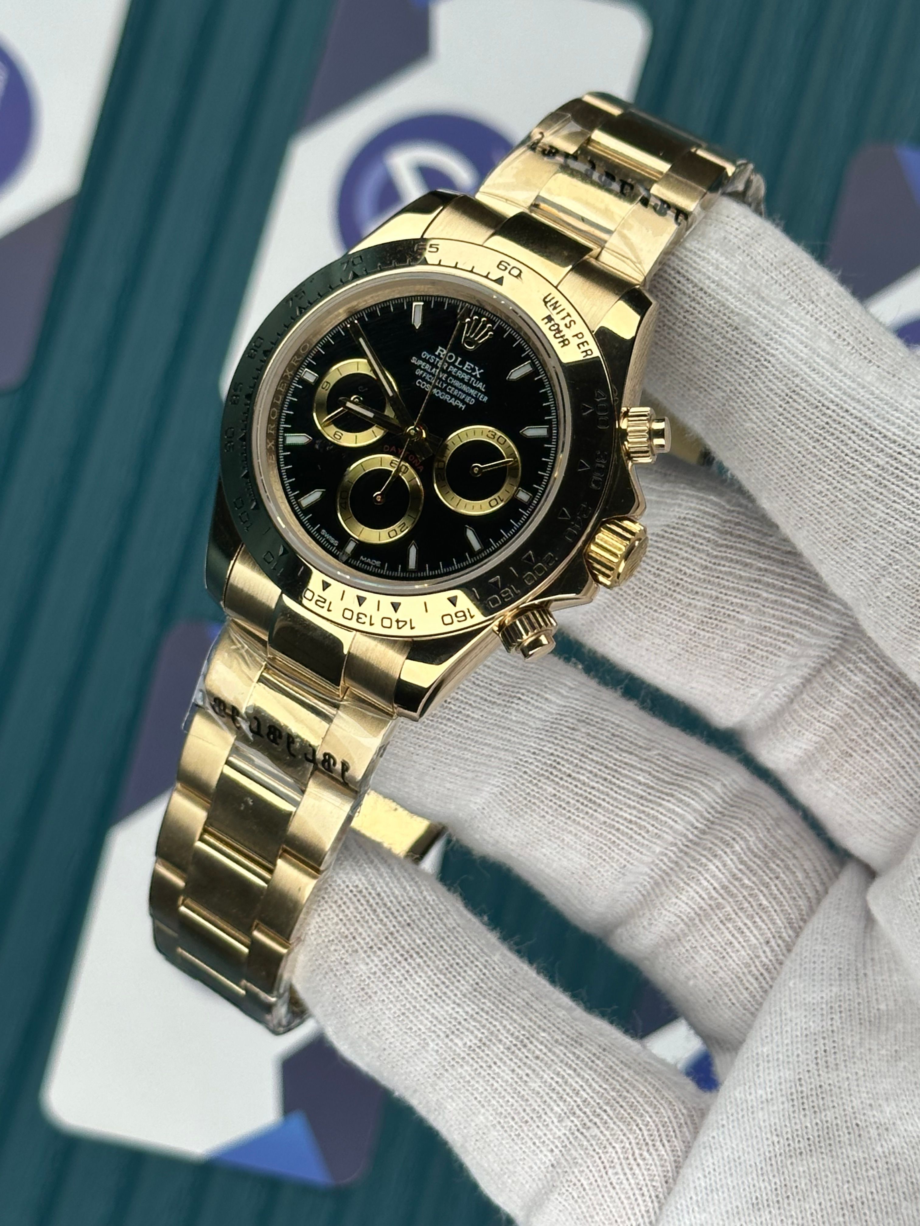 ROLEX DAYTONA BLACK DIAL OYSTER GOLD
