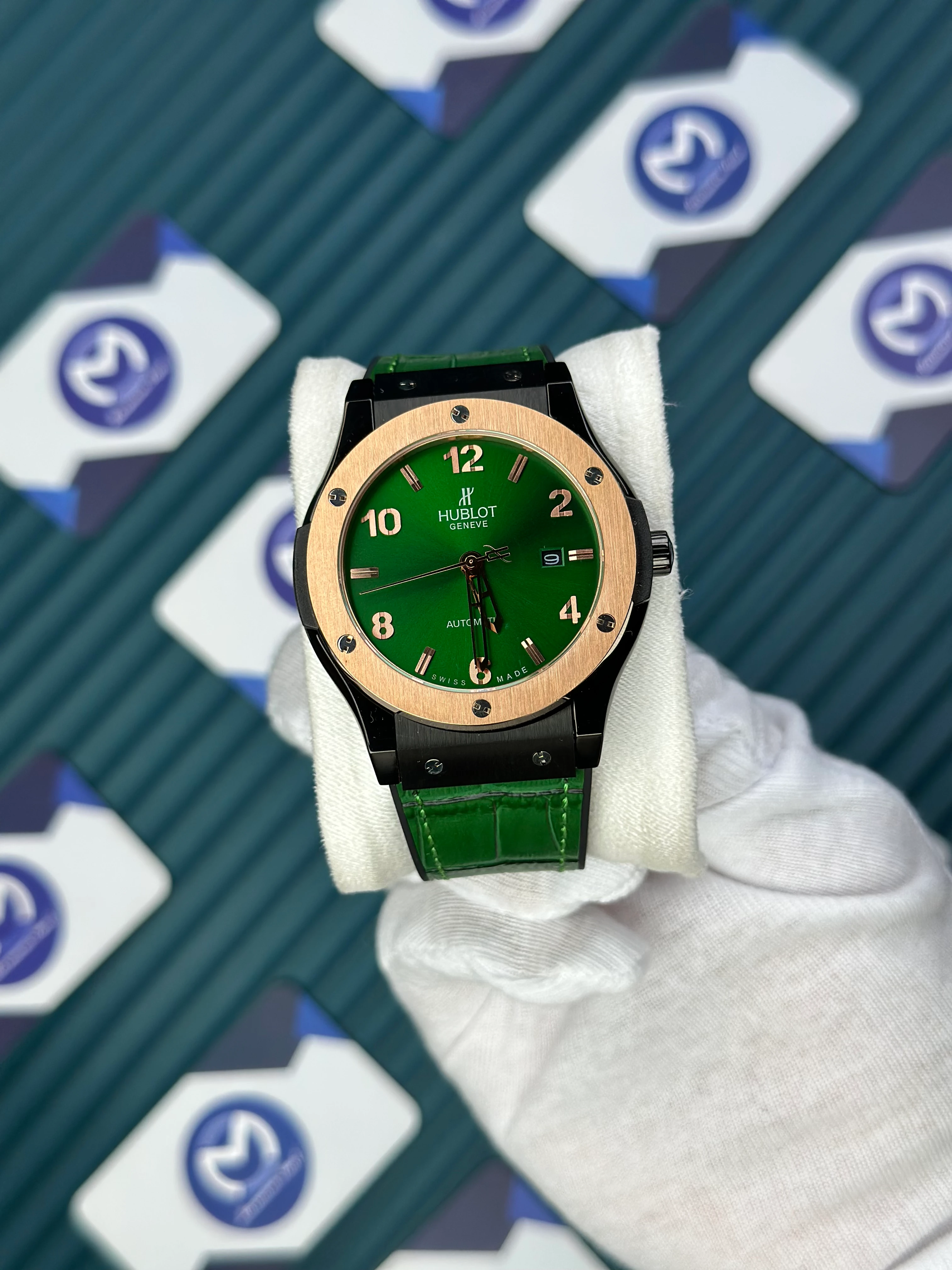 HUBLOT GENEVE AUTOMATIC GREEN DIAL ROSE BEZEL BLACK CASE GREEN LEATHER CORD