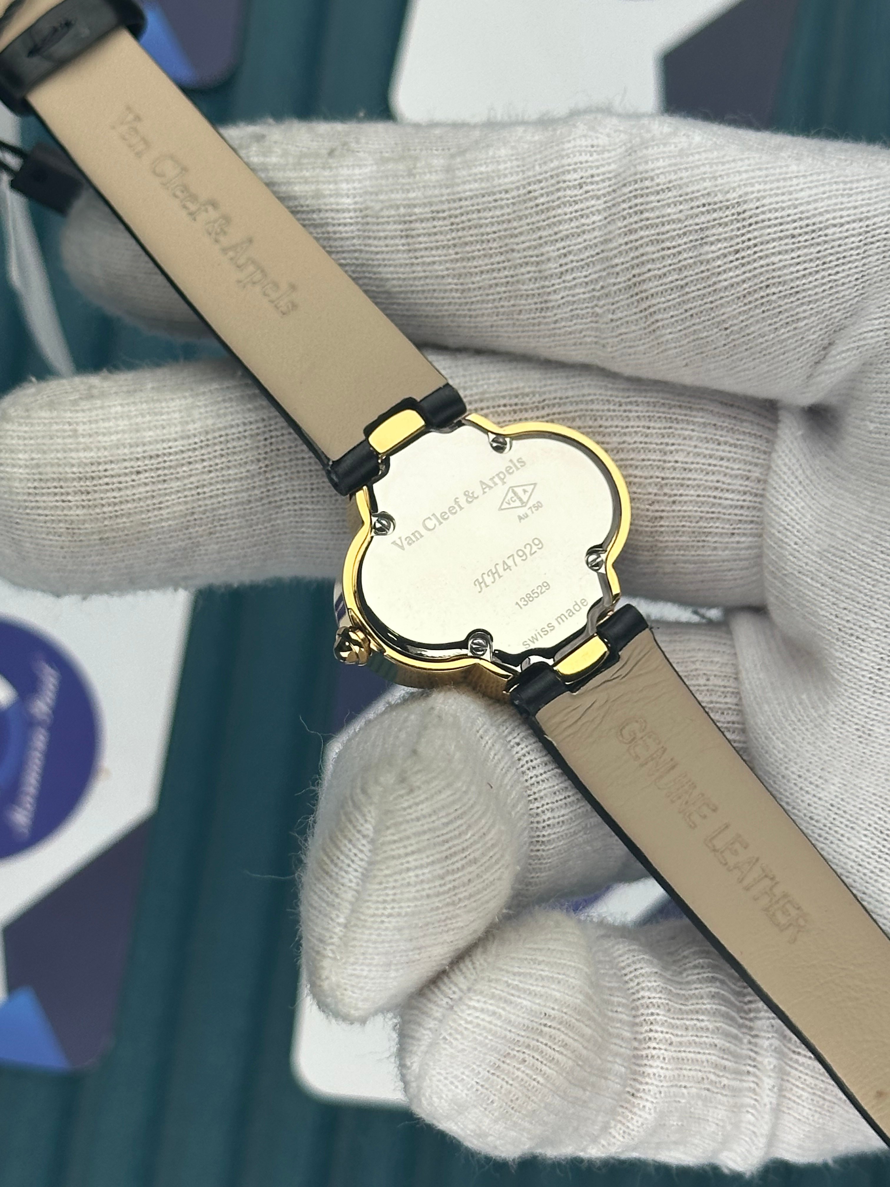 VAN CLEEF & ARPELS BLACK DIAL DIAMOND BEZEL GOLD CASE BLACK LEATHER CORD
