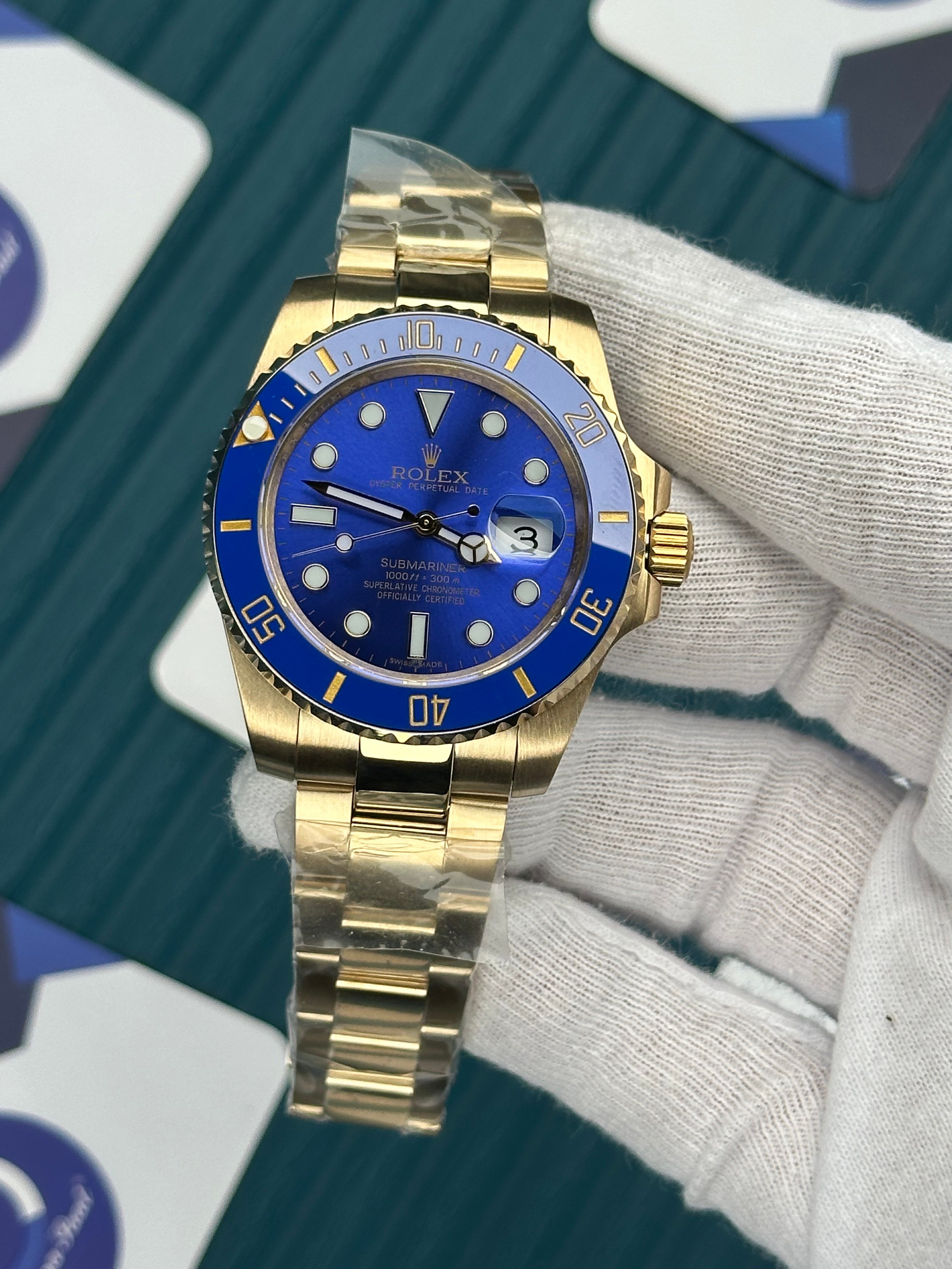 ROLEX SUBMARINER BLUE DIAL GOLD OYSTER