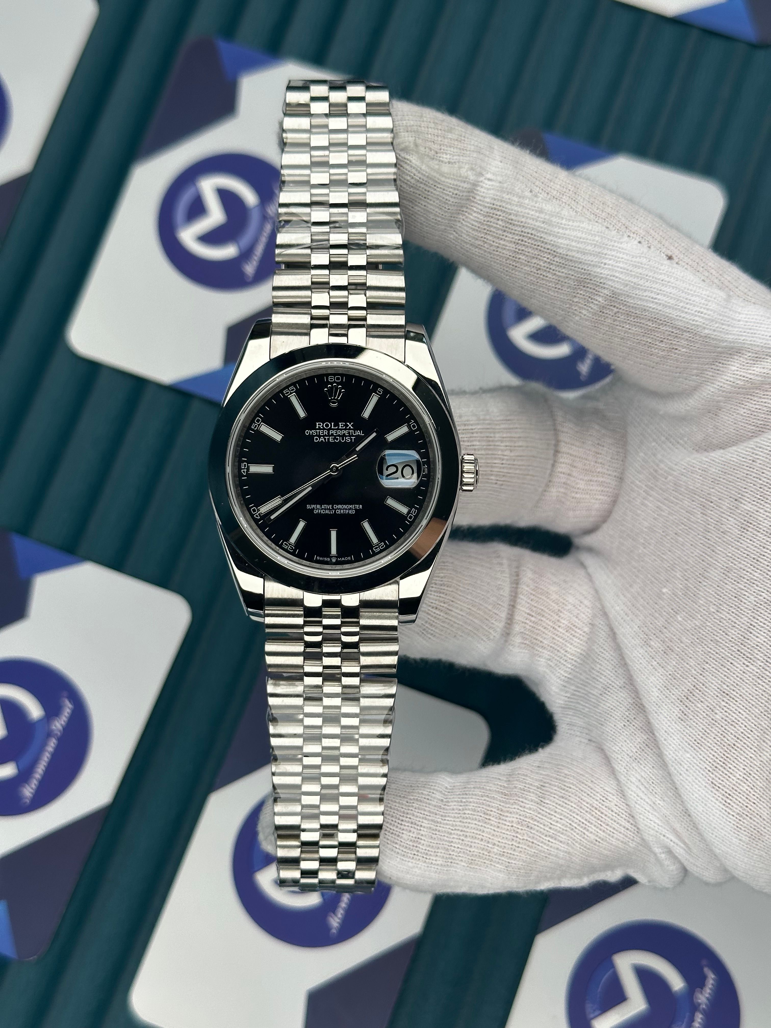ROLEX DATEJUST BLACK DIAL OVAL BEZEL SILVER JUBILE