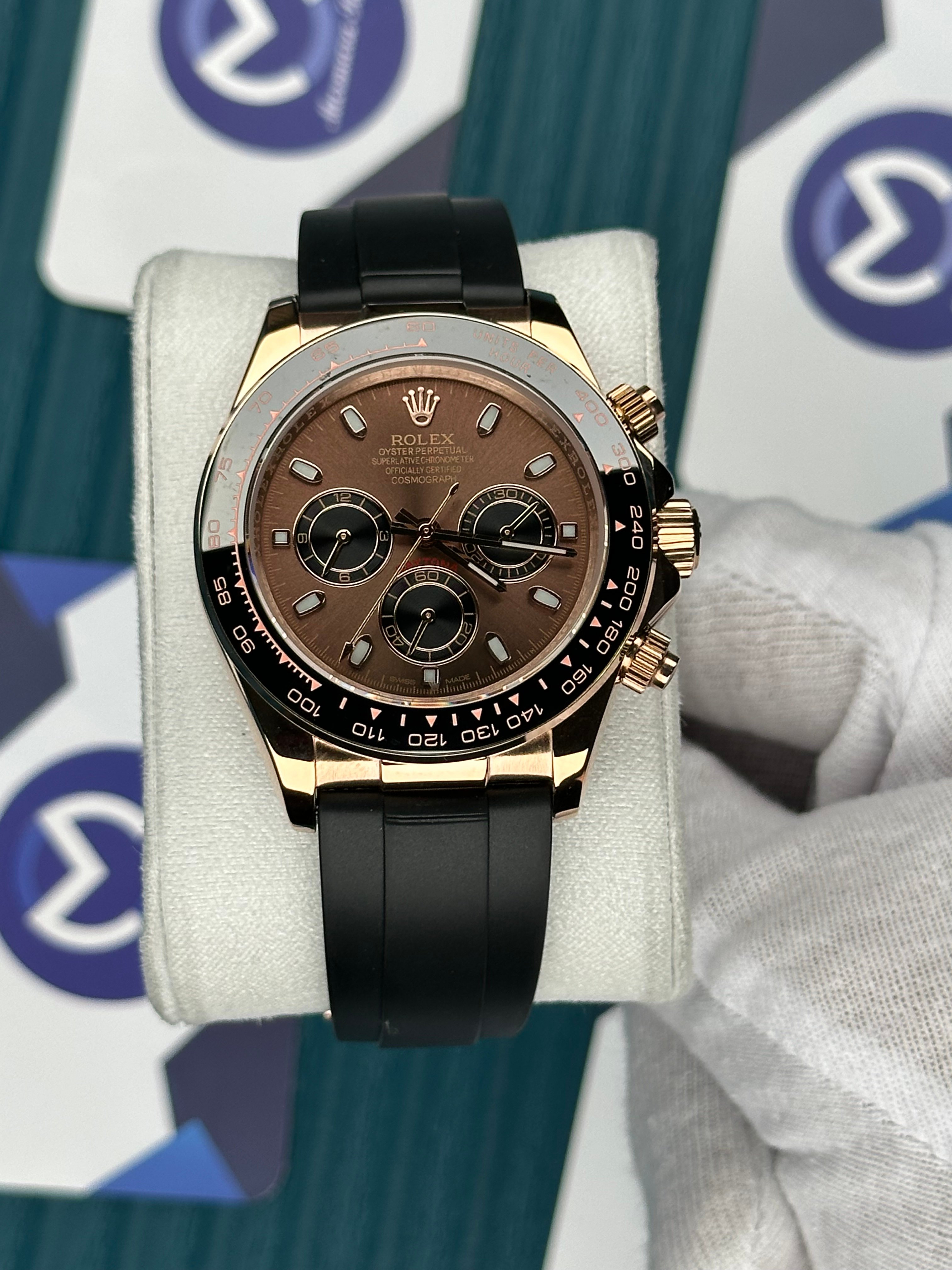 ROLEX DAYTONA BROWN DIAL ROSE CASE BLACK OYSTERFLEX