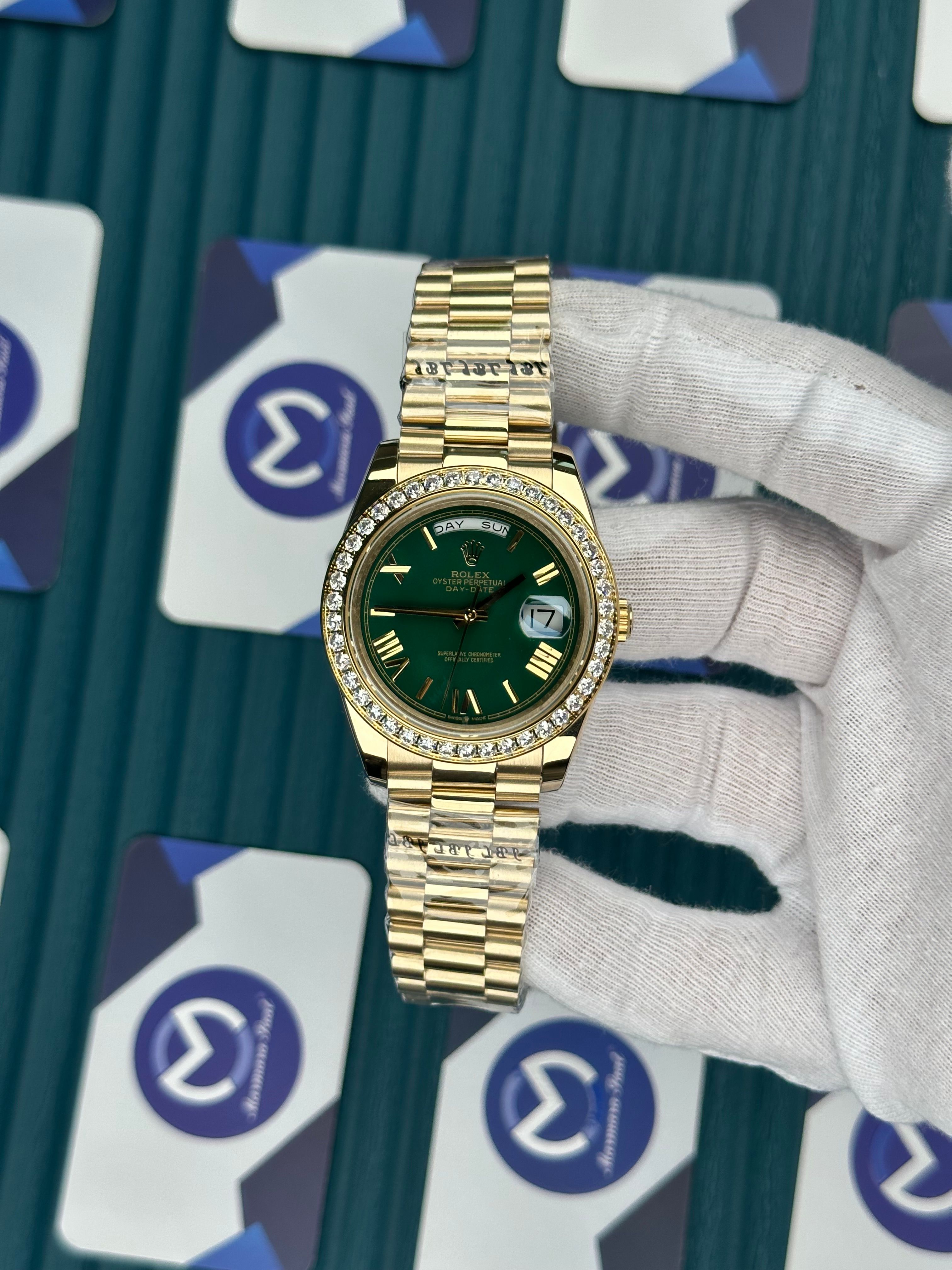 ROLEX DAY-DATE GREEN DIAL ROMA INDEX DIAMOND BEZEL GOLD PRESIDENT