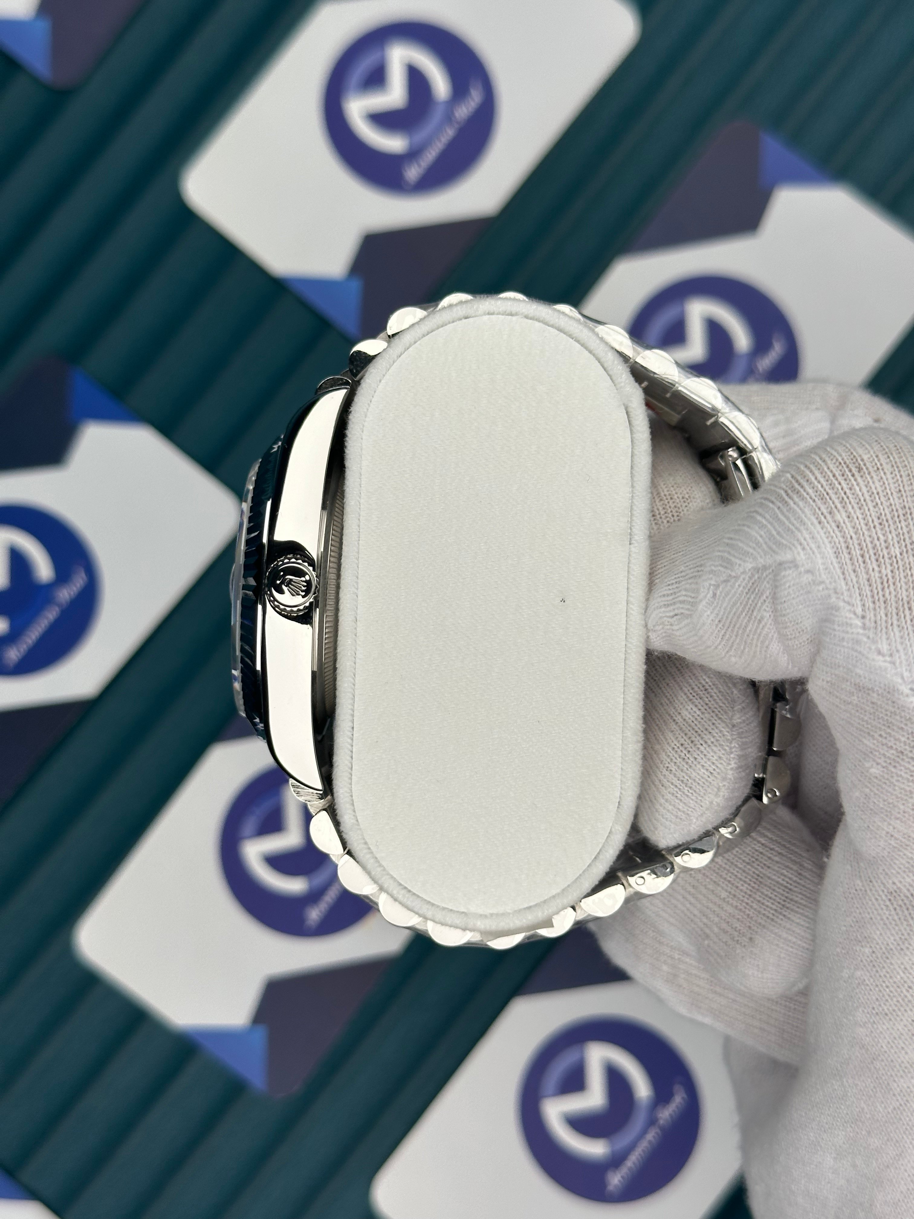 ROLEX DAY-DATE BLUE DIAL OVAL BEZEL DIAMOND INDEX SILVER PRESIDENT