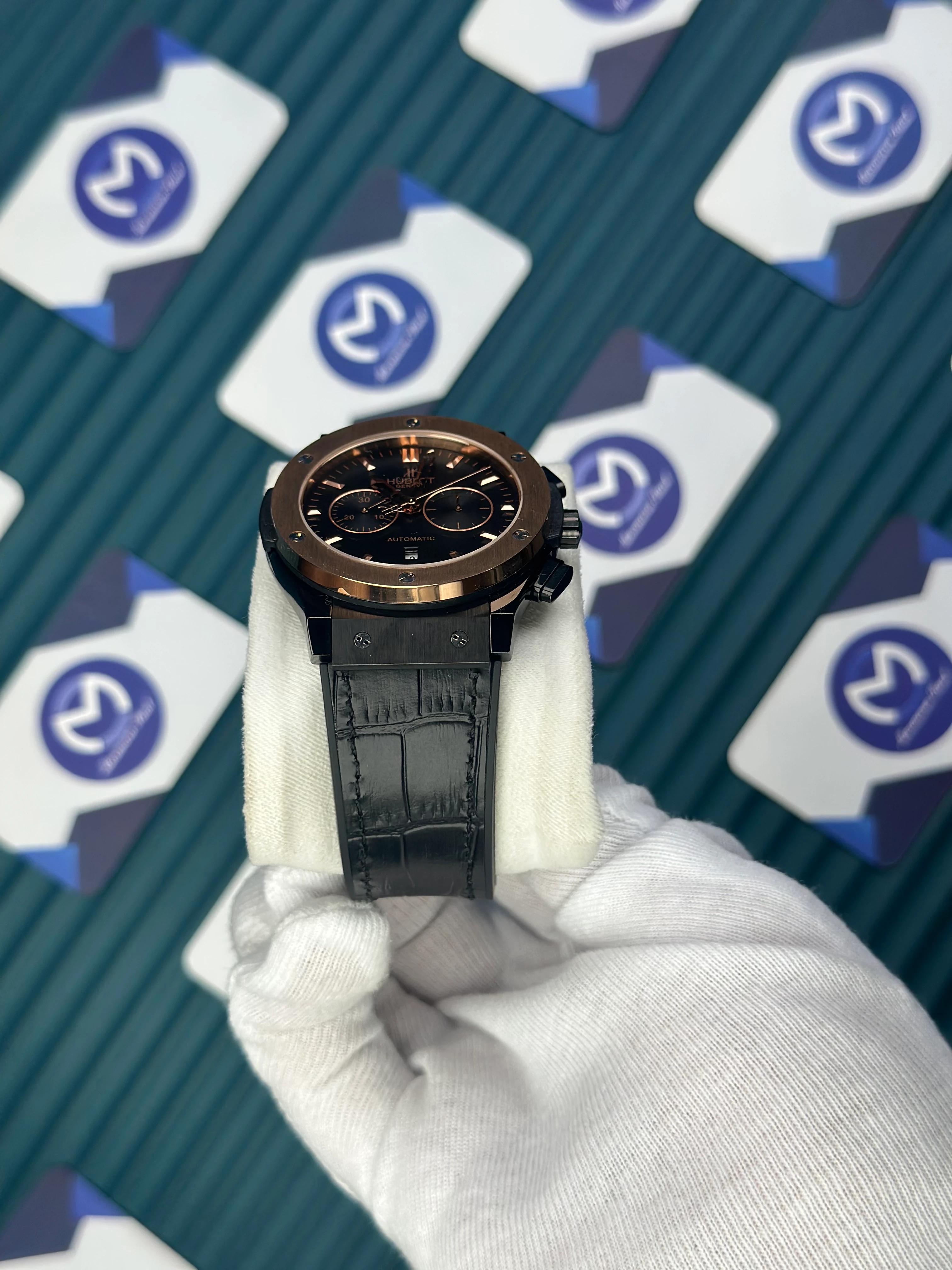 HUBLOT AUTOMATIC BLACK CHRONOGRAPH DIAL ROSE CASE BLACK CASE BLACK LEATHER CORD 