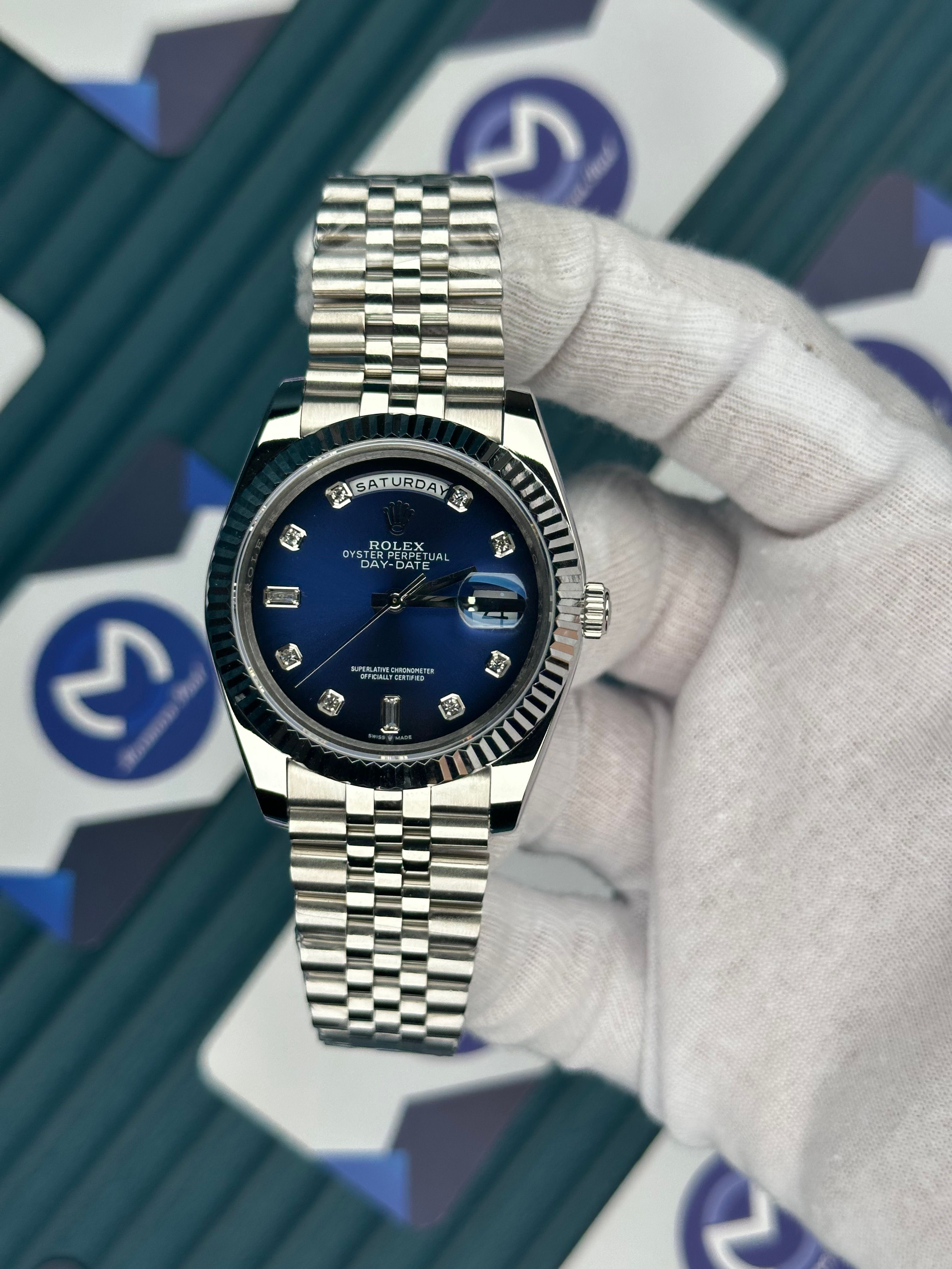 ROLEX DAY-DATE BLUE DIAL DIAMOND INDEX SILVER JUBILE