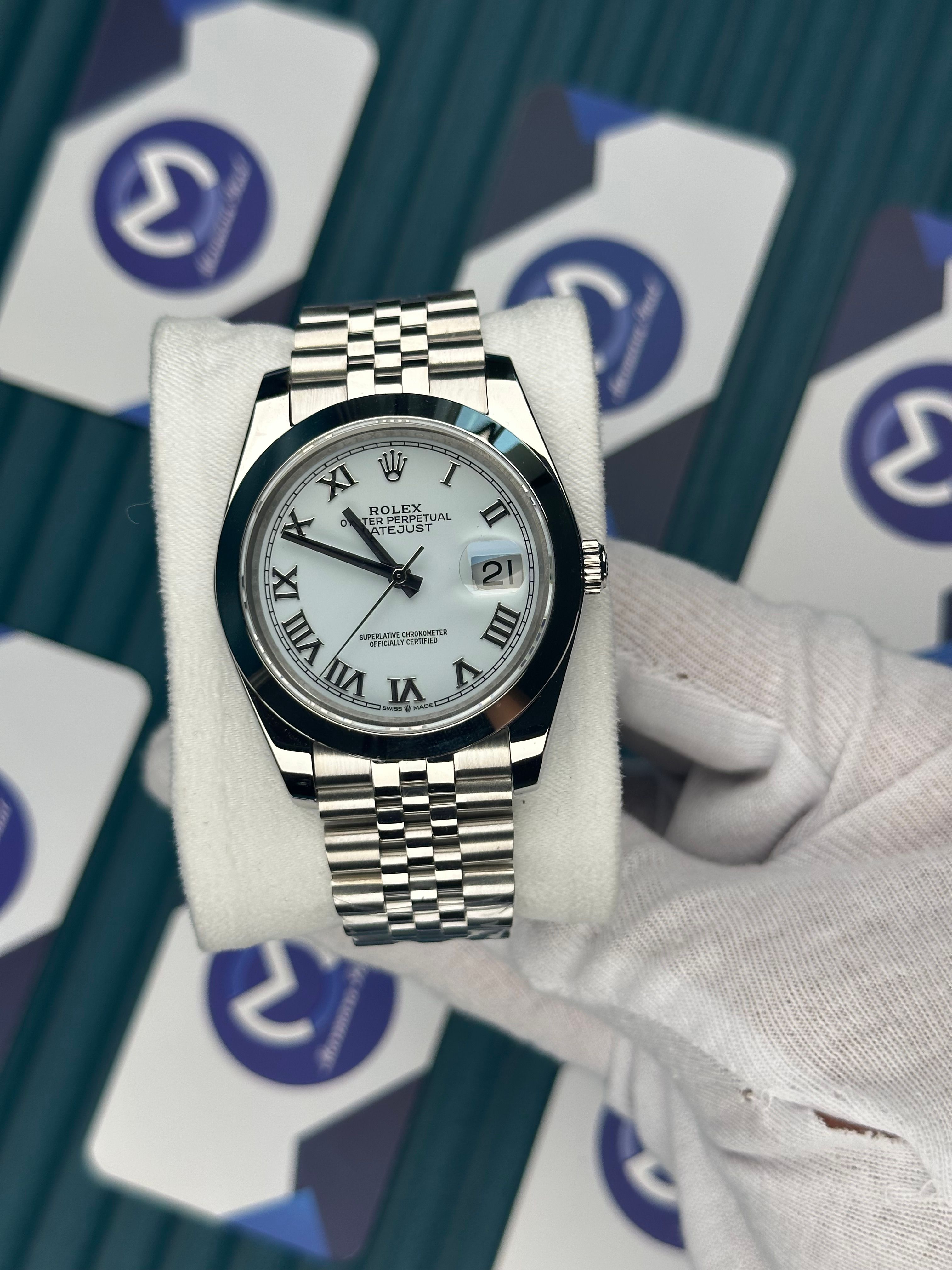 ROLEX DATEJUST WHITE DIAL OVAL BEZEL SILVER ROMA INDEX SILVER JUBILE