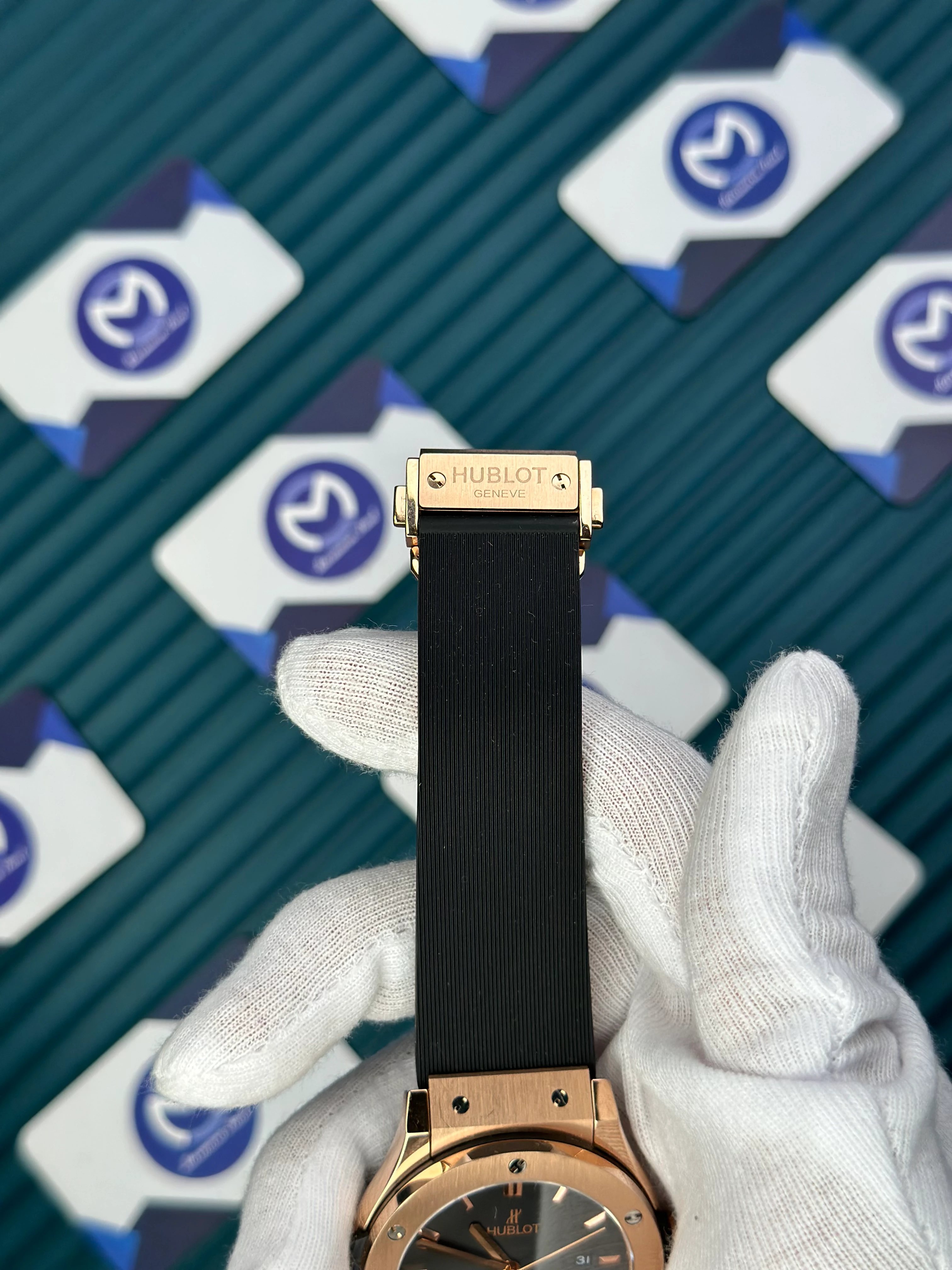 HUBLOT GENEVE AUTOMATIC VENDOME BLACK DIAL ROSE BEZEL BLACK CASE BLACK RUBBER CORD 