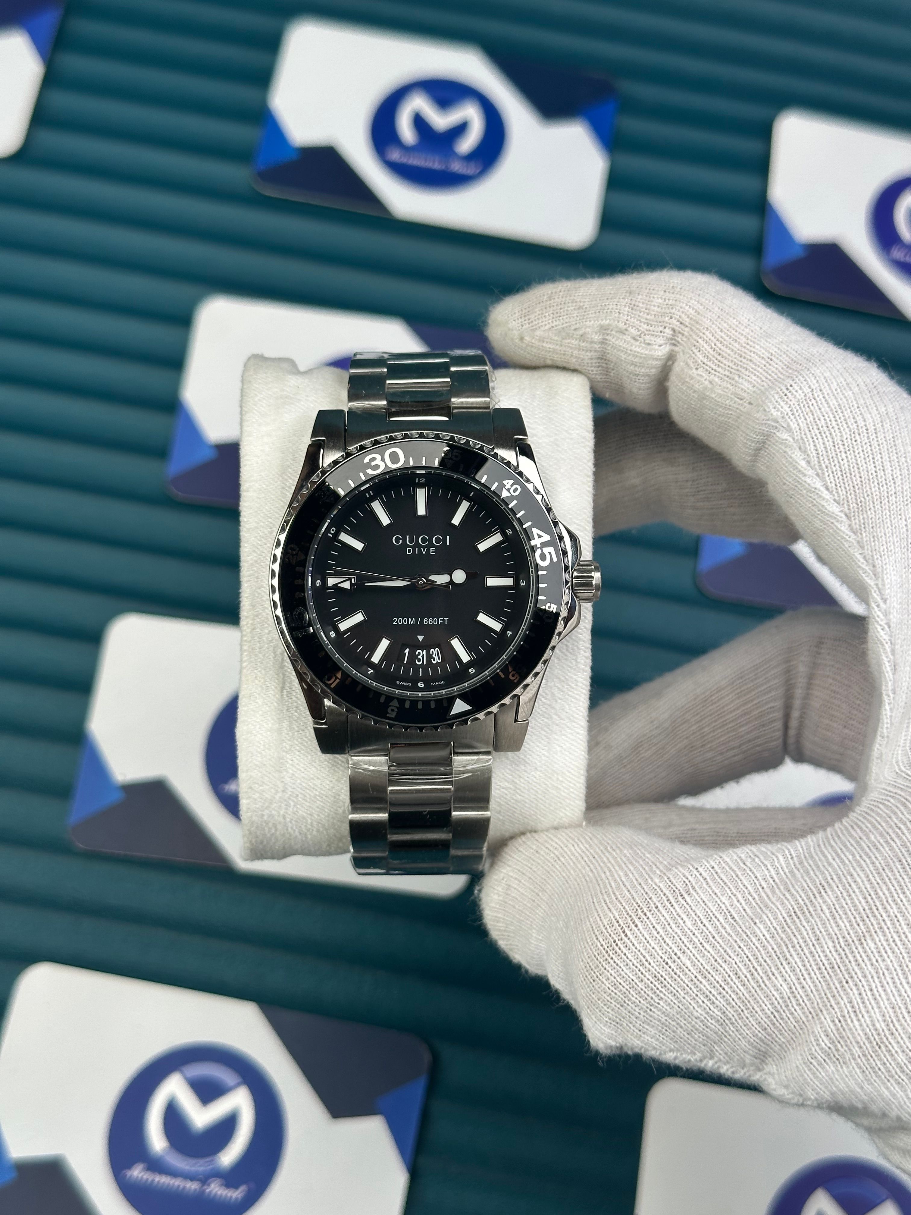 GUCCI BLACK DIAL PHOSPHOROUS INDEX SILVER CORD