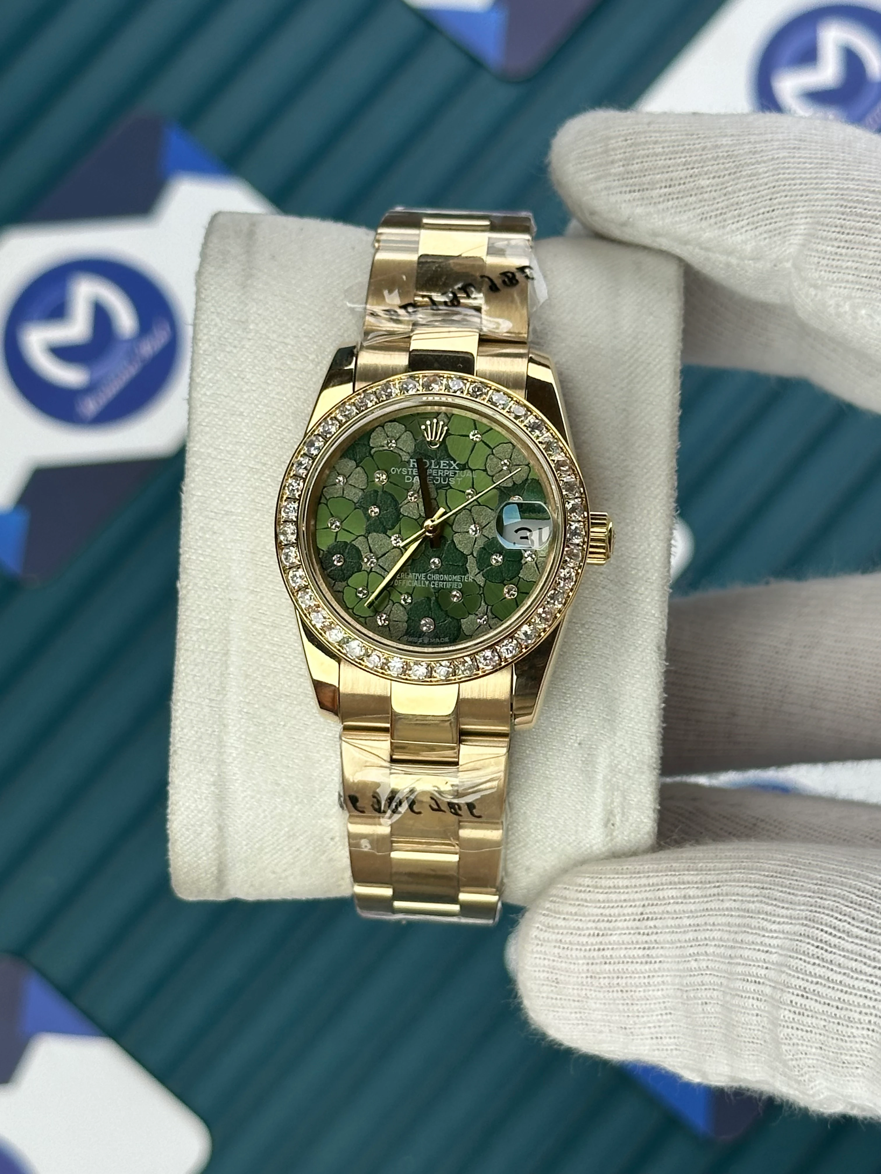 ROLEX 31 MM DATEJUST GREEN FLOWERS PATTERNED DIAL DIAMOND BEZEL GOLD OYSTER 