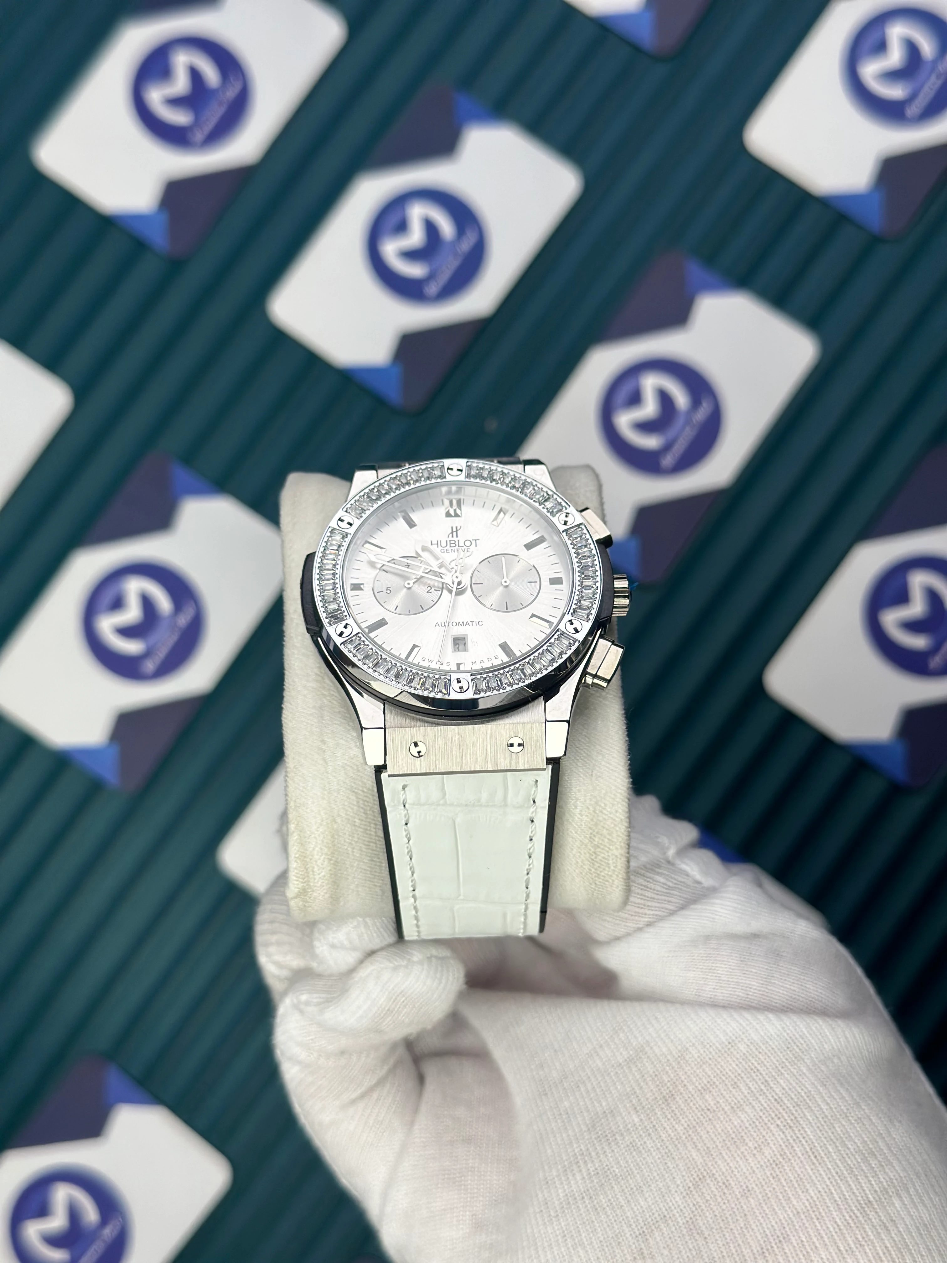 HUBLOT AUTOMATIC WHITE CHRONOGRAPH DIAL DIAMOND BEZEL WHITE LEATHER CORD 