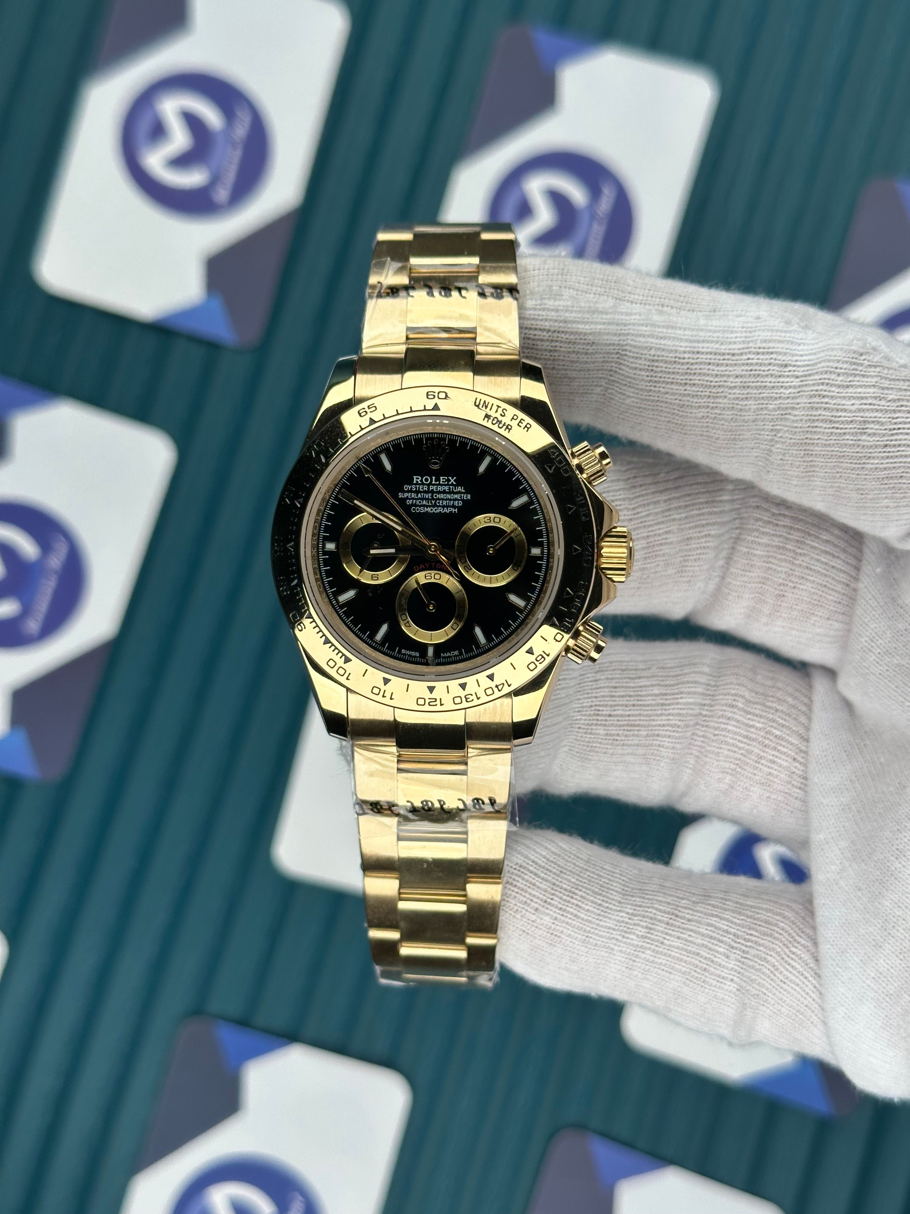 ROLEX DAYTONA BLACK DIAL OYSTER GOLD
