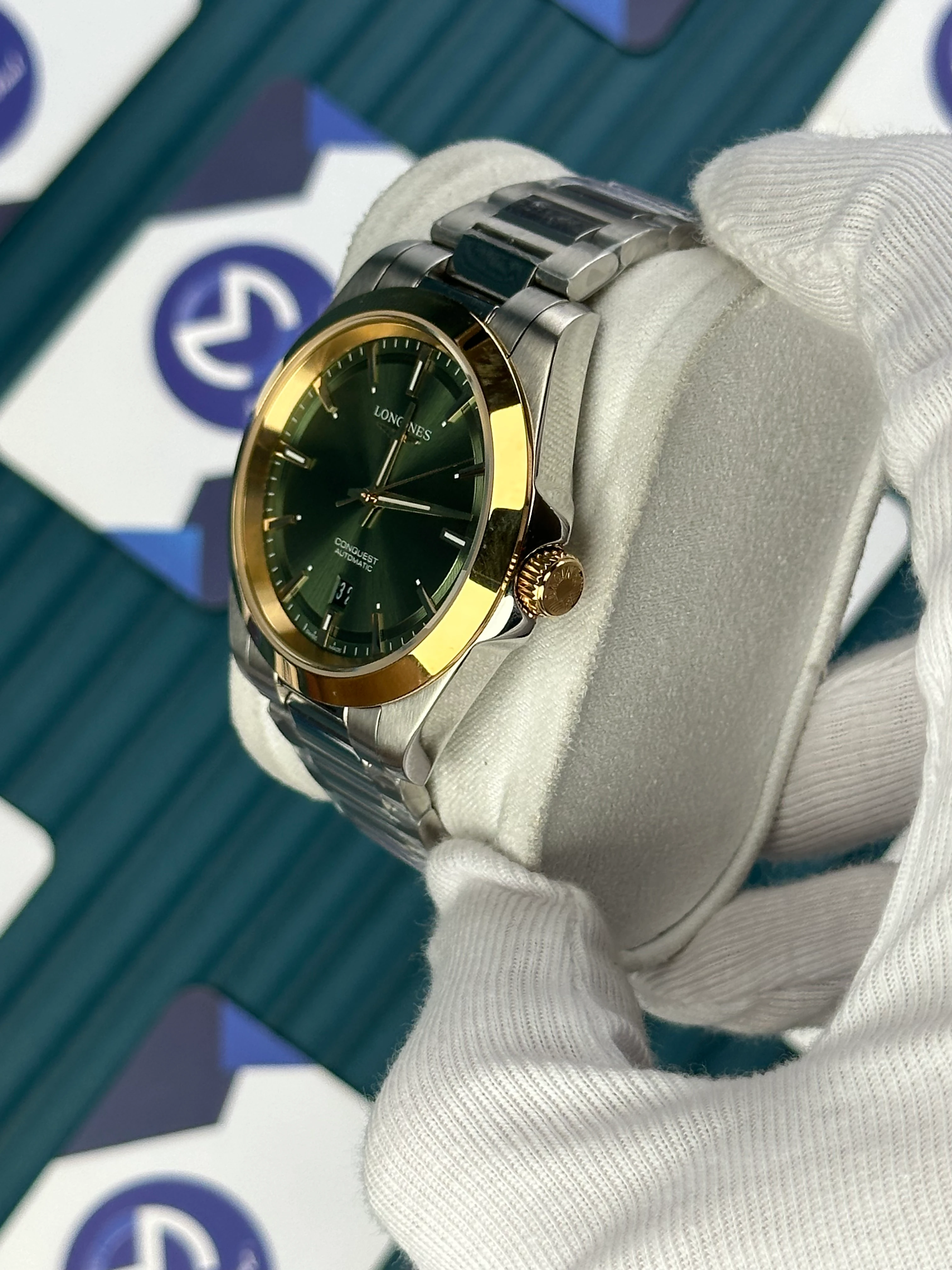 LONGINES CONQUEST AUTOMATIC GREEN DIAL GOLD BEZEL SILVER 