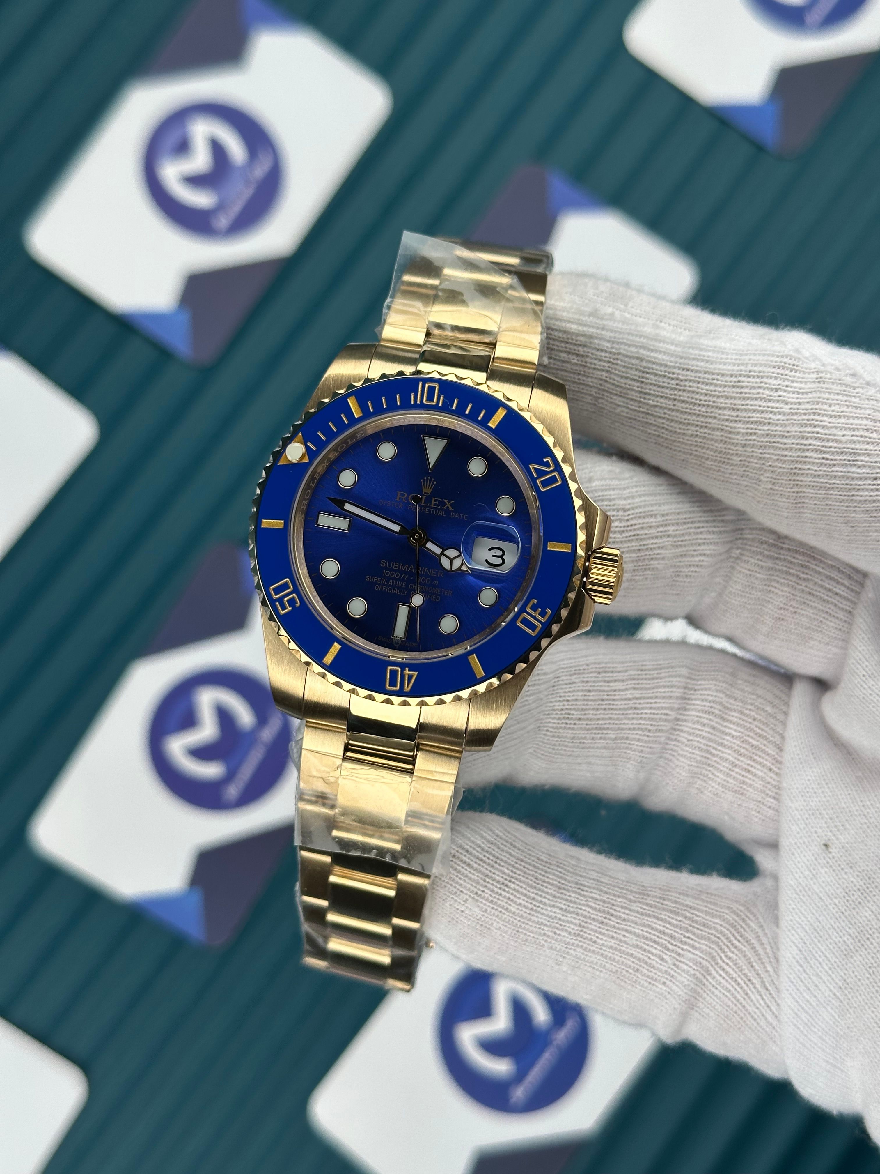 ROLEX SUBMARINER BLUE DIAL GOLD OYSTER