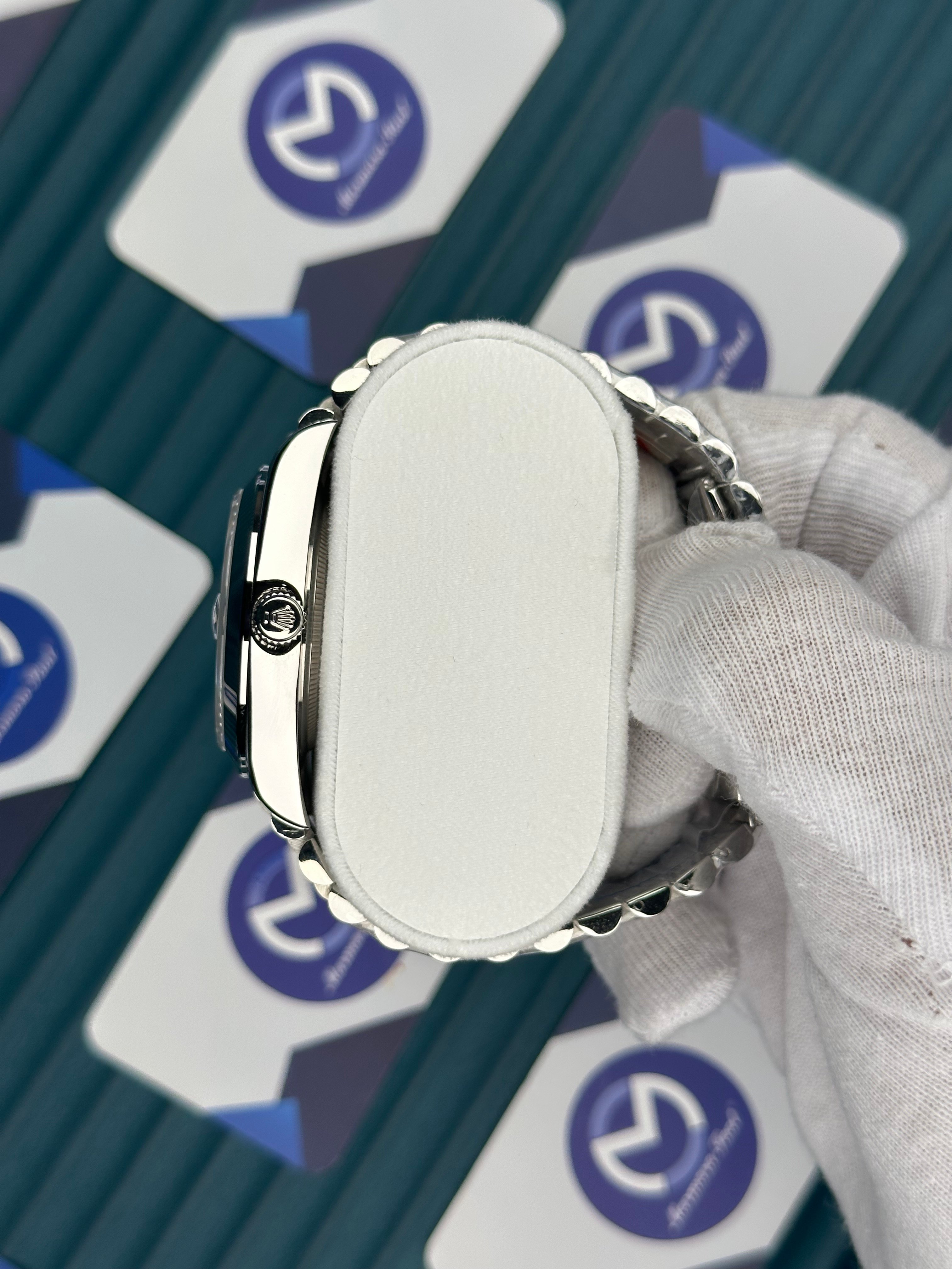 ROLEX DAY-DATE BLUE OCEAN DIAL OVAL BEZEL SILVER PRESIDENT