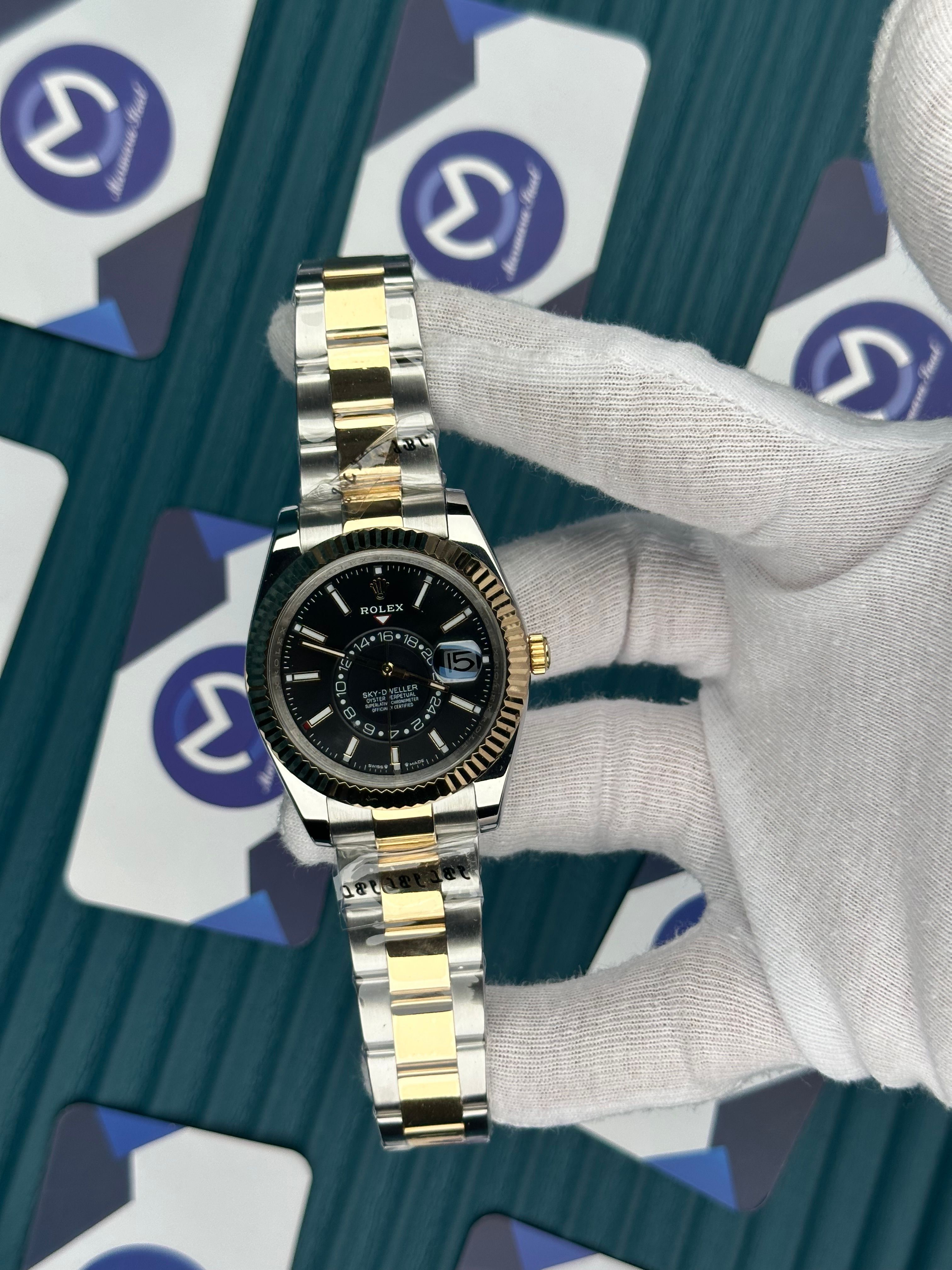 ROLEX SKY-DWELLER BLACK DIAL GOLD-SILVER OYSTER