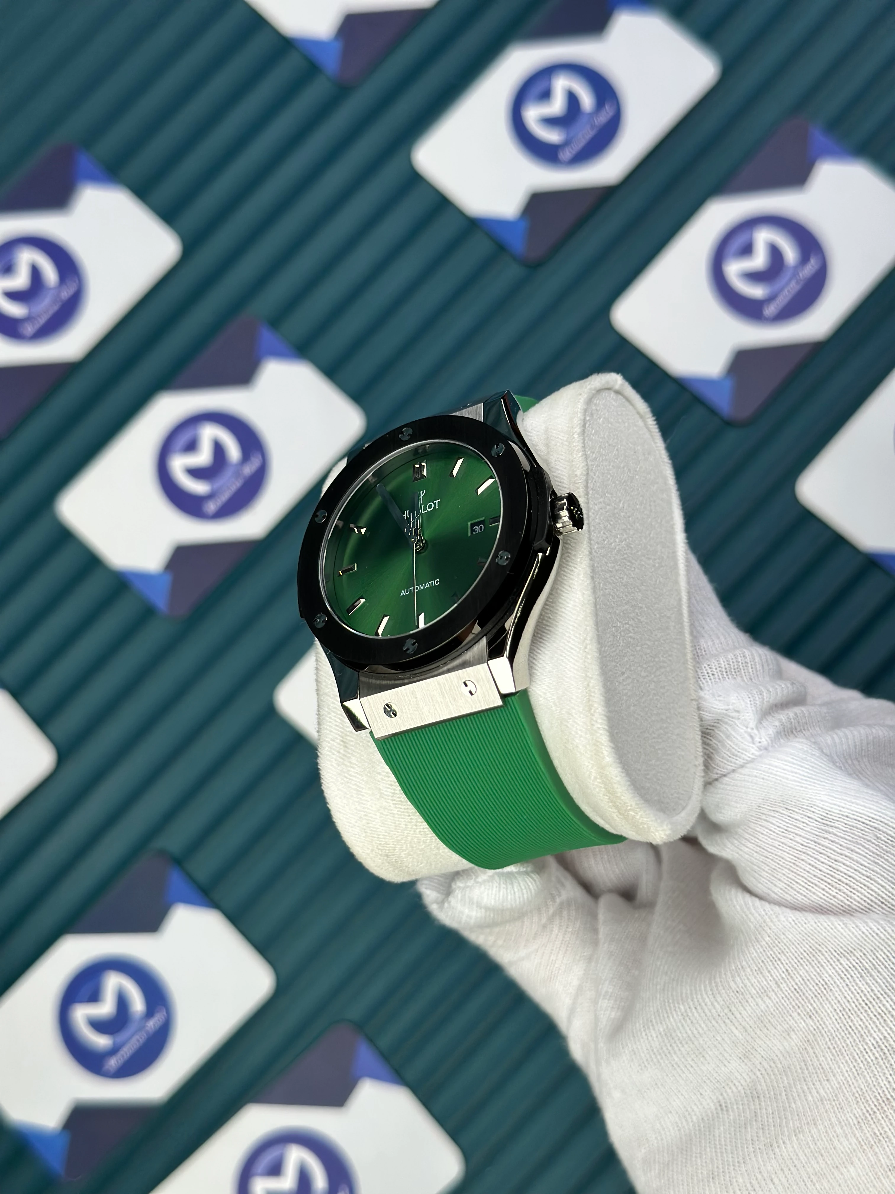 HUBLOT GENEVE AUTOMATIC VENDOME GREEN DIAL SILVER CASE BLACK BEZEL GREEN RUBBER CORD 