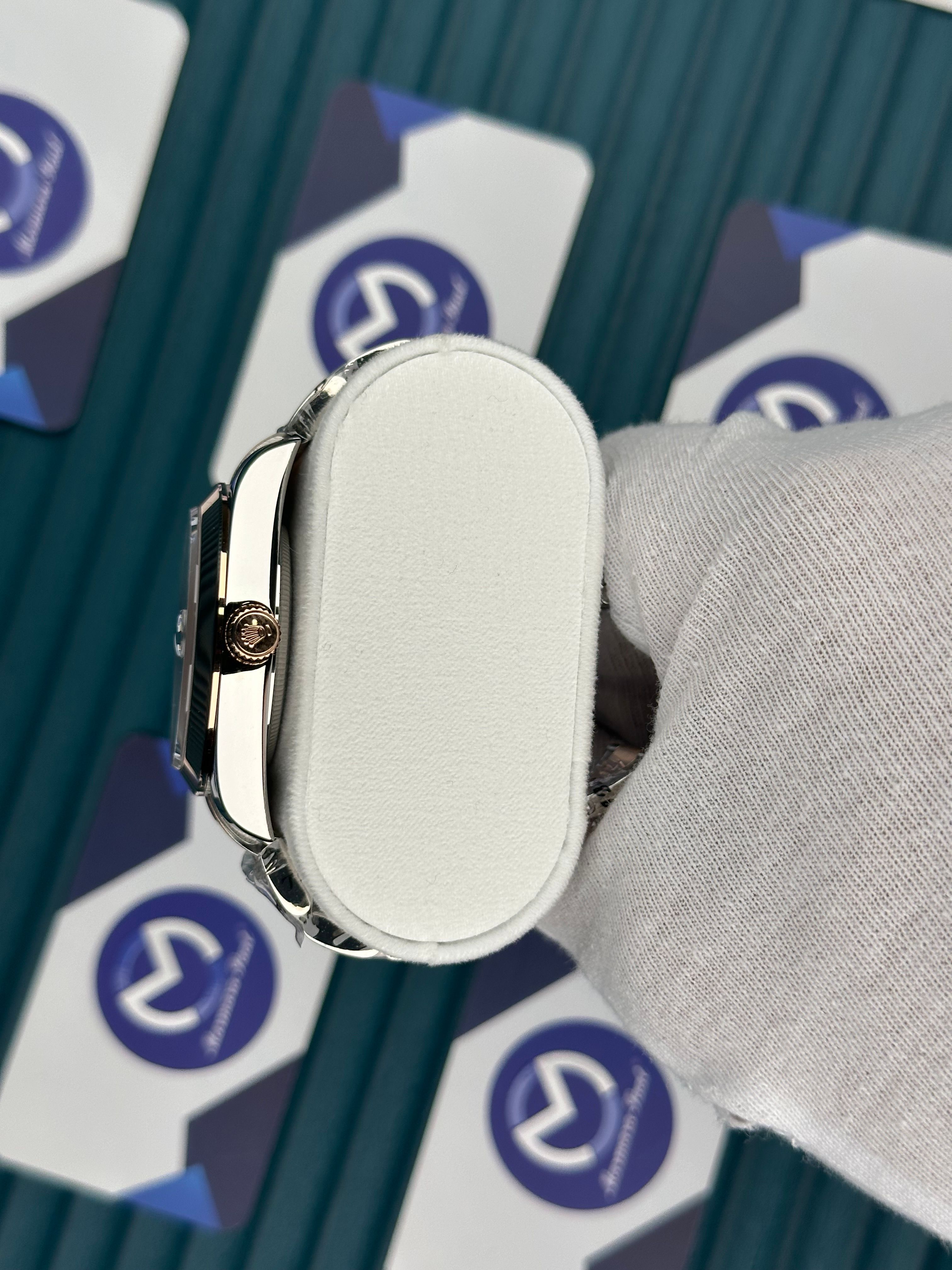 ROLEX DATEJUST CHOCOLATE OVAL BEZEL ROSESILVER OYSTER