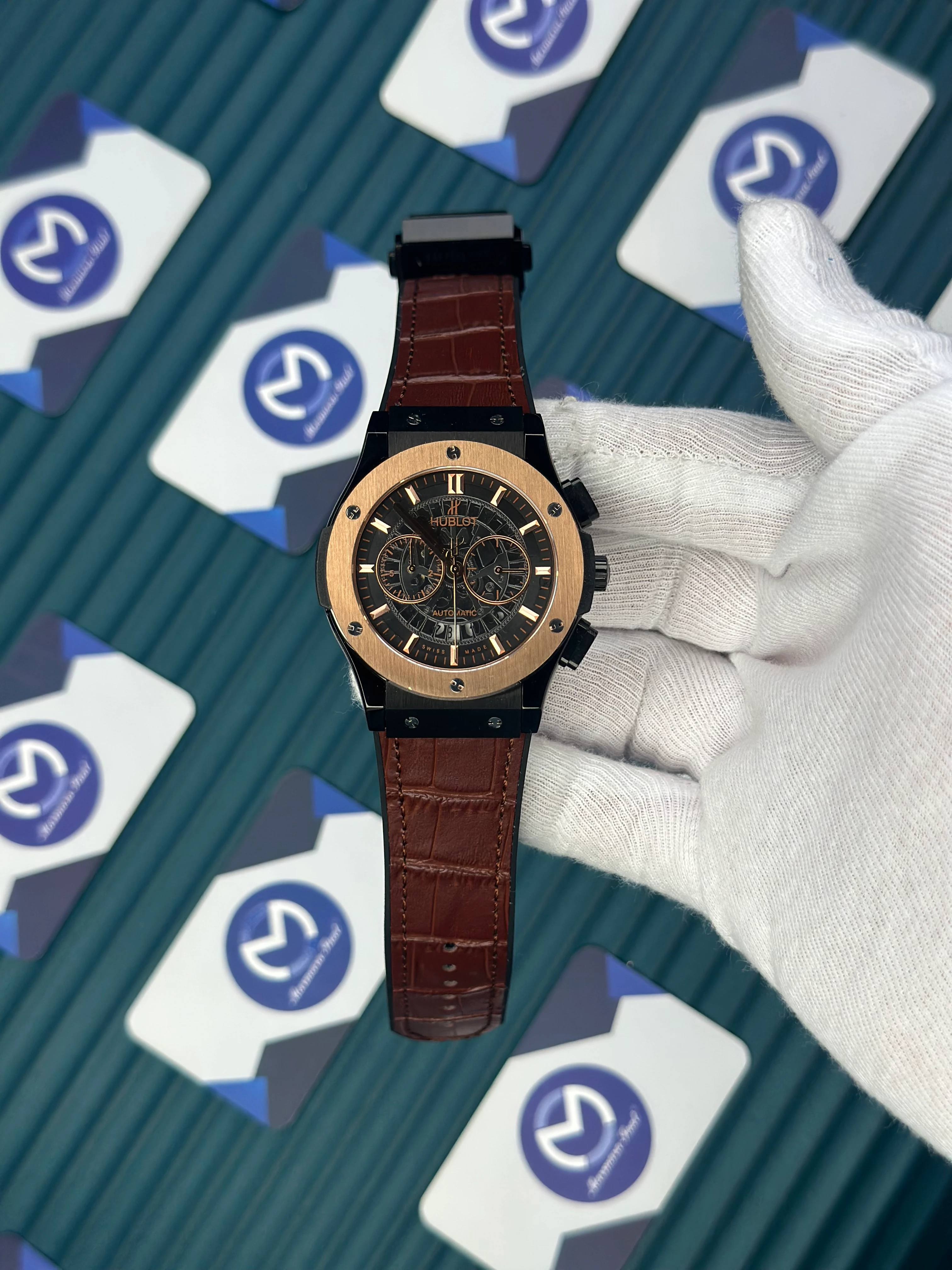 HUBLOT AUTOMATIC SKELETON DIAL ROSE BEZEL BLACK CASE BROWN LEATHER CORD 