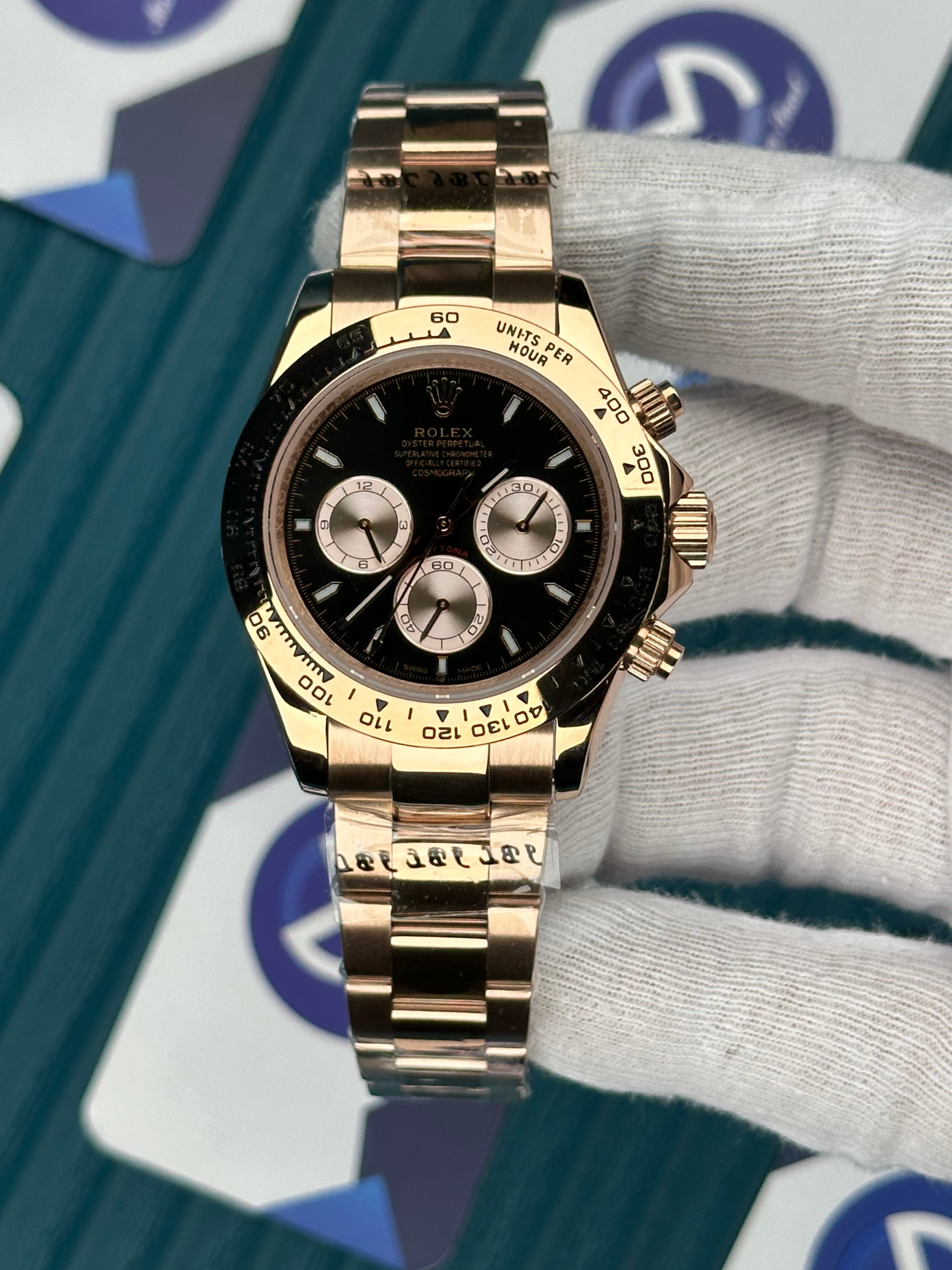 ROLEX DAYTONA BLACK DIAL ROSE OYSTER