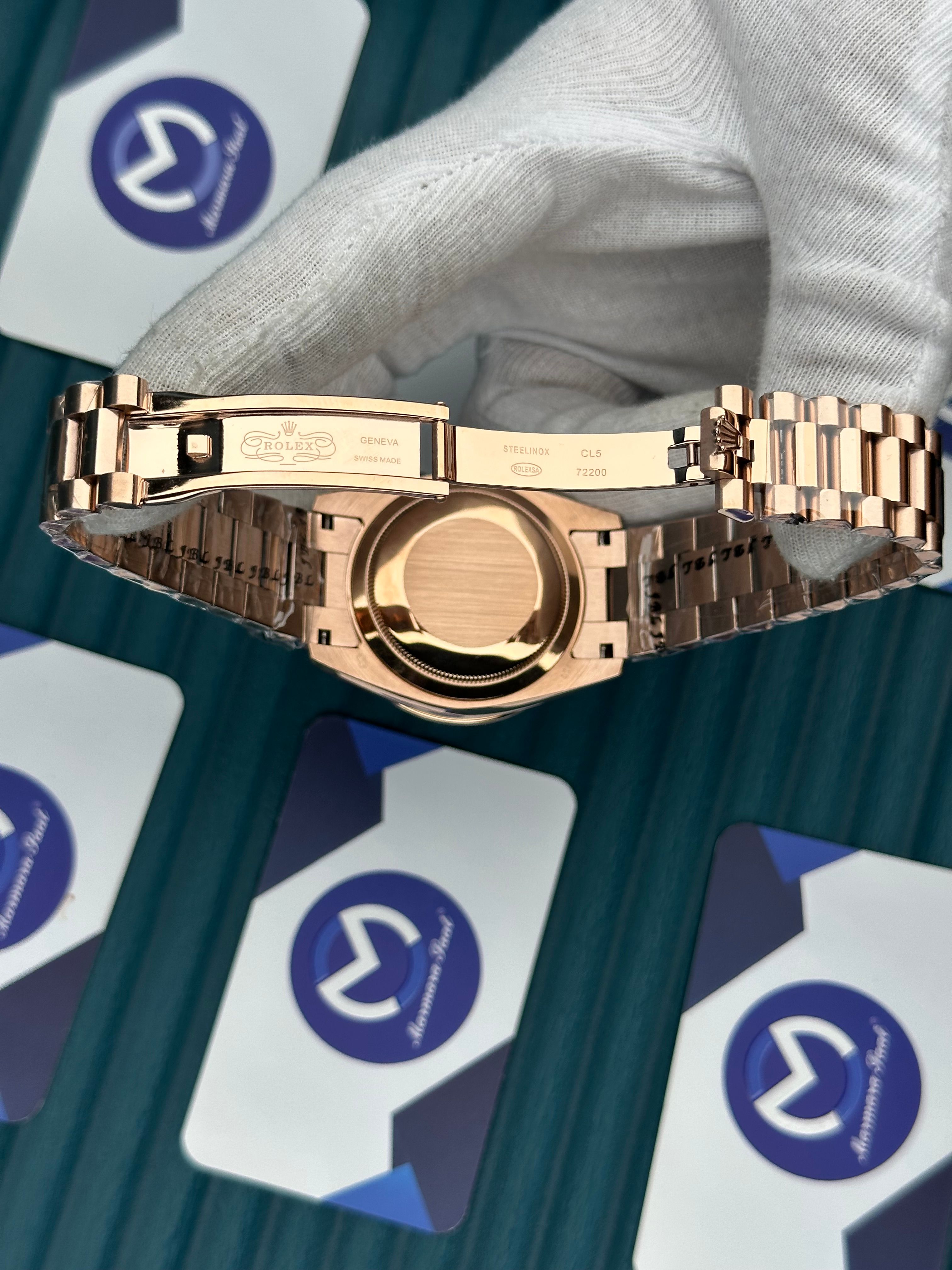 ROLEX DAY-DATE BLACK DIAL OVAL BEZEL ROSE PRESIDENT