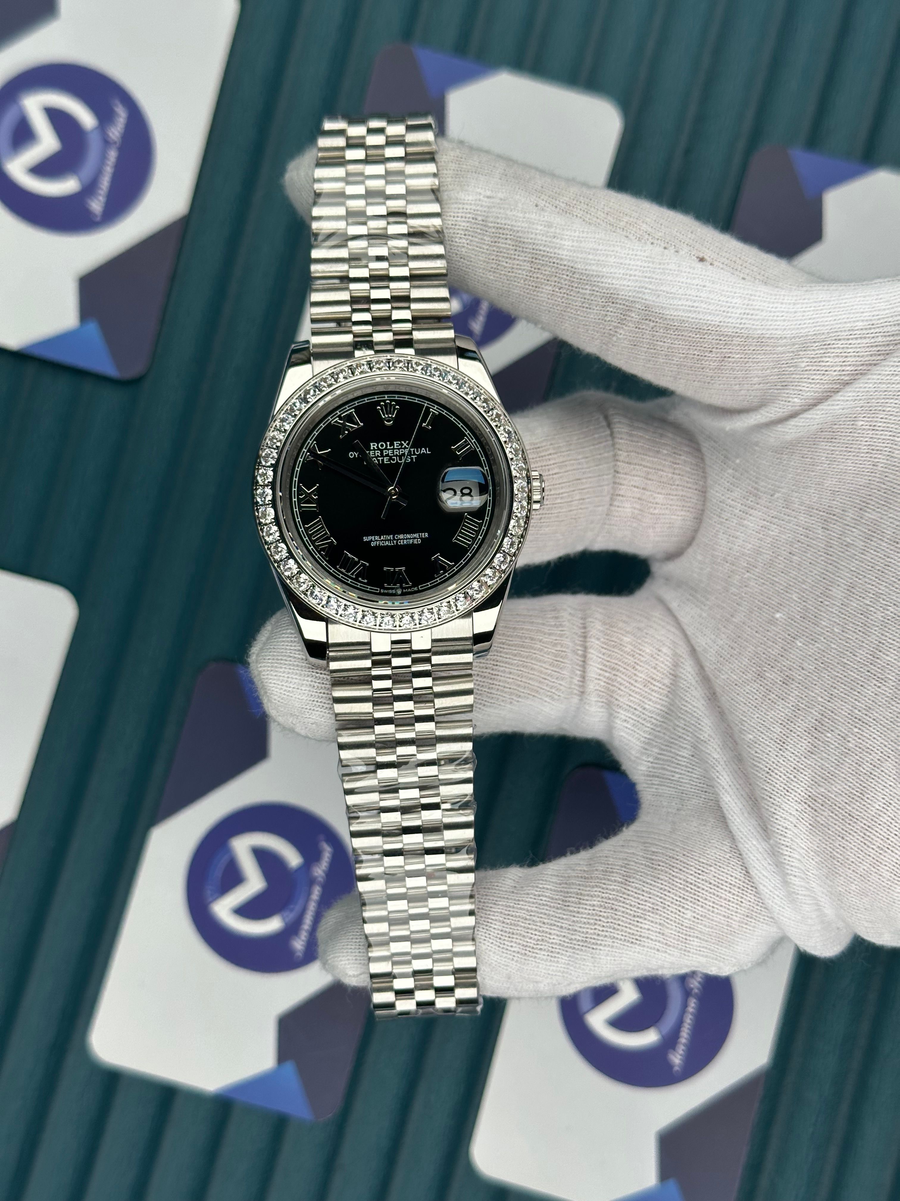 ROLEX DATEJUST BLACK DIAL DIAMOND BEZELROMA INDEX SILVER JUBILE