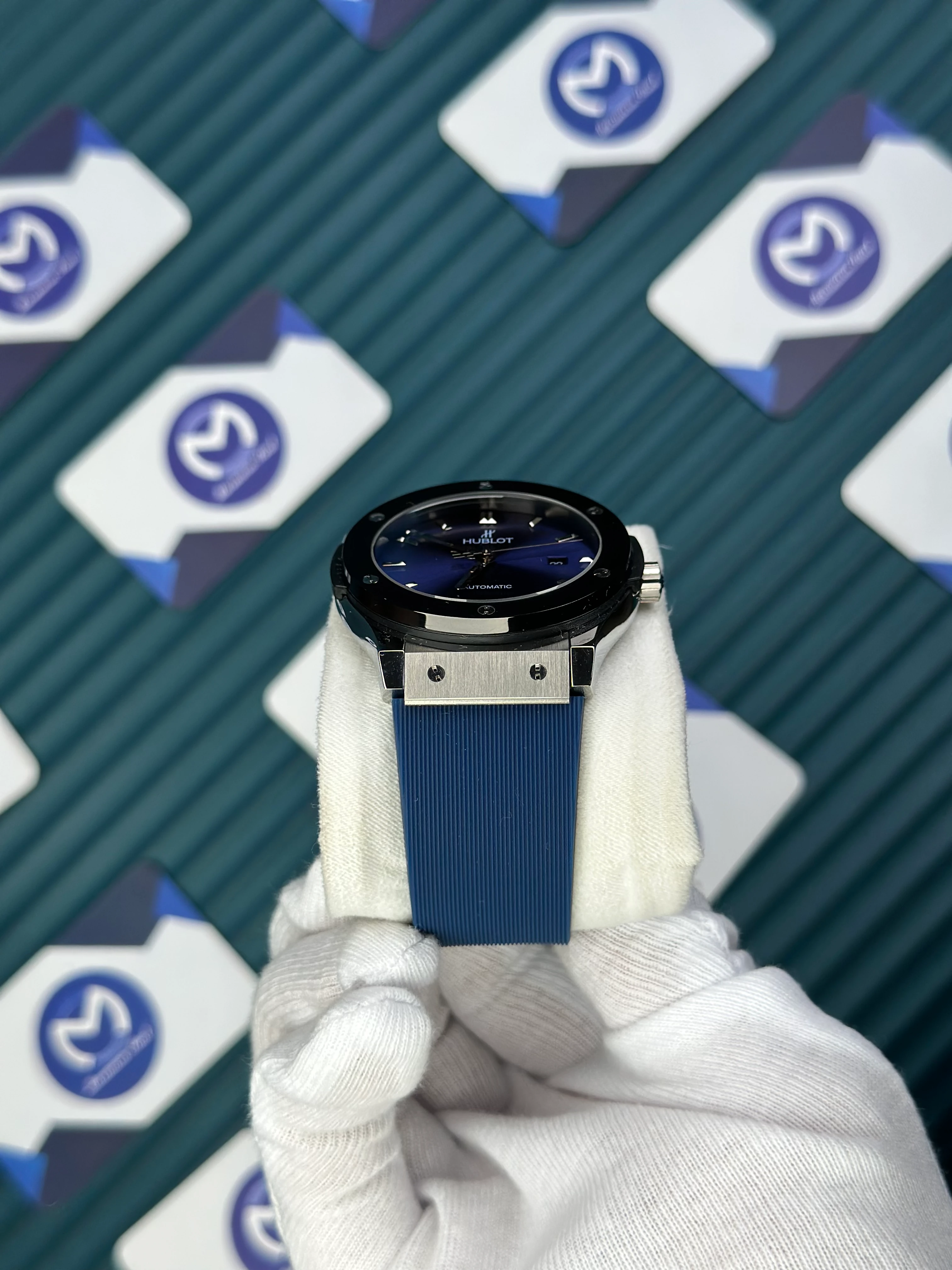 HUBLOT GENEVE AUTOMATIC VENDOME BLUE DIAL SILVER CASE BLACK BEZEL BLUE RUBBER CORD