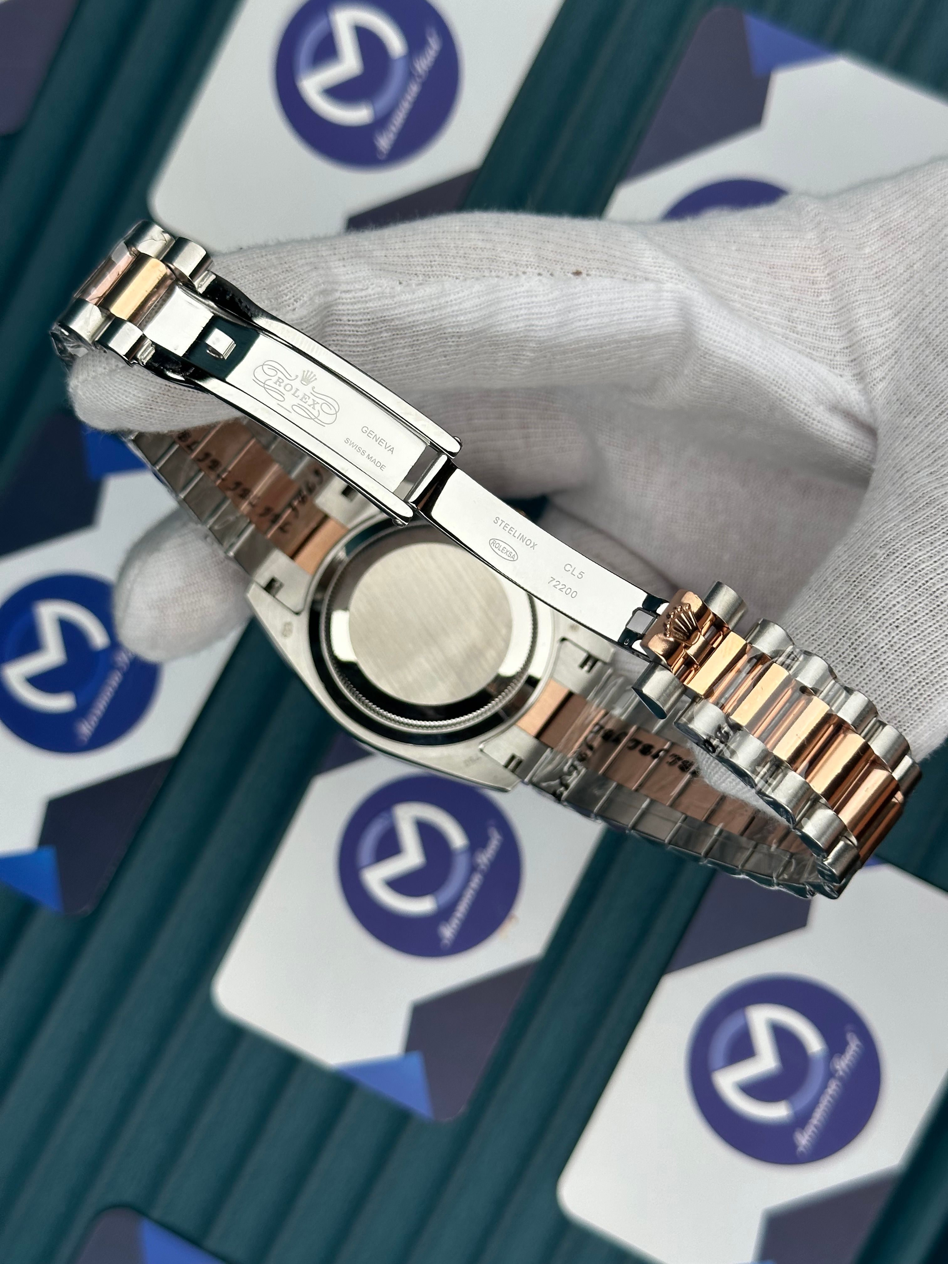 ROLEX DAY-DATE CHOCOLATE OVAL BEZEL ROSE-SILVER PRESIDENT