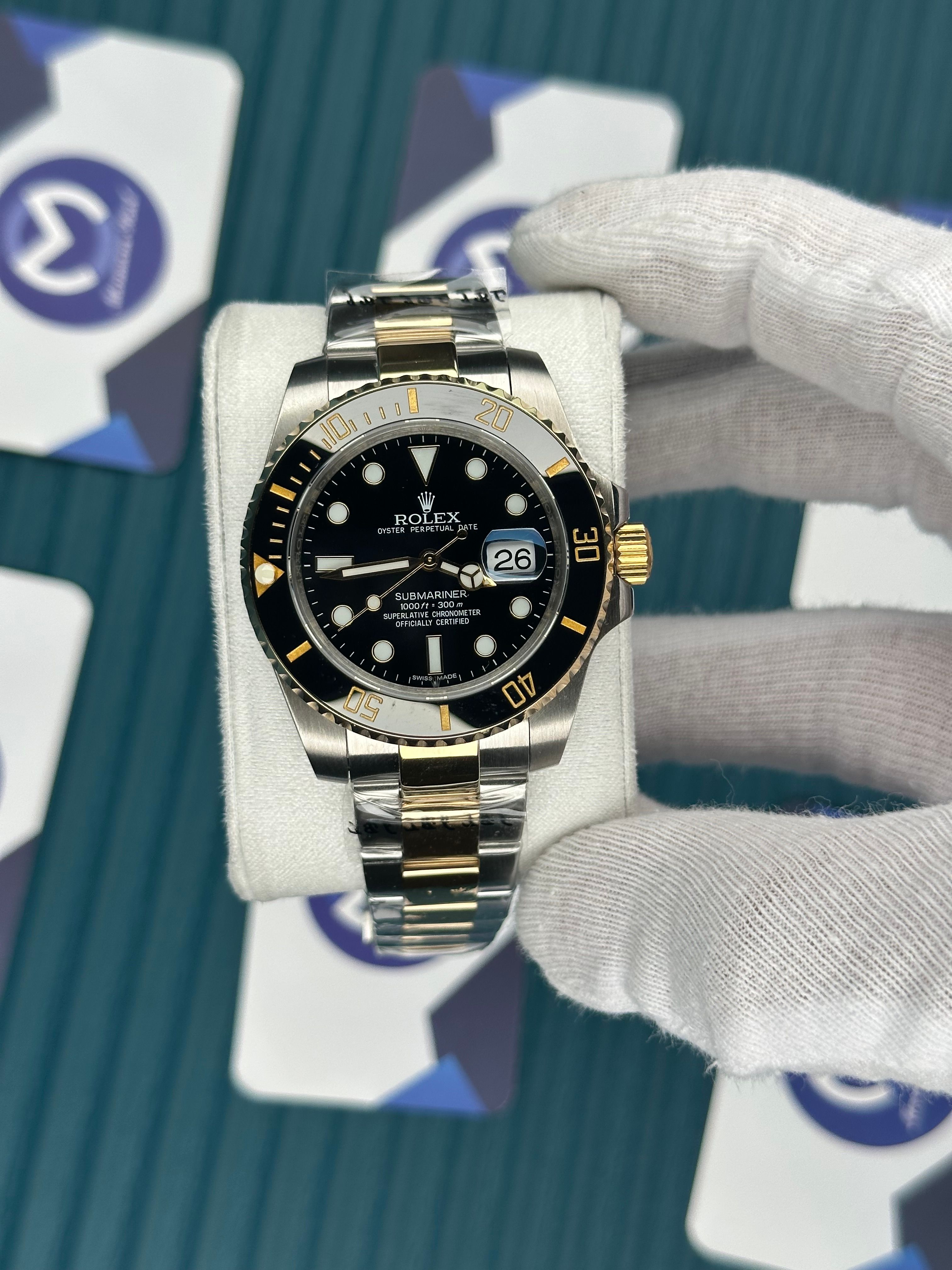 ROLEX SUBMARINER BLACK DIAL GOLD-SILVER OYSTER