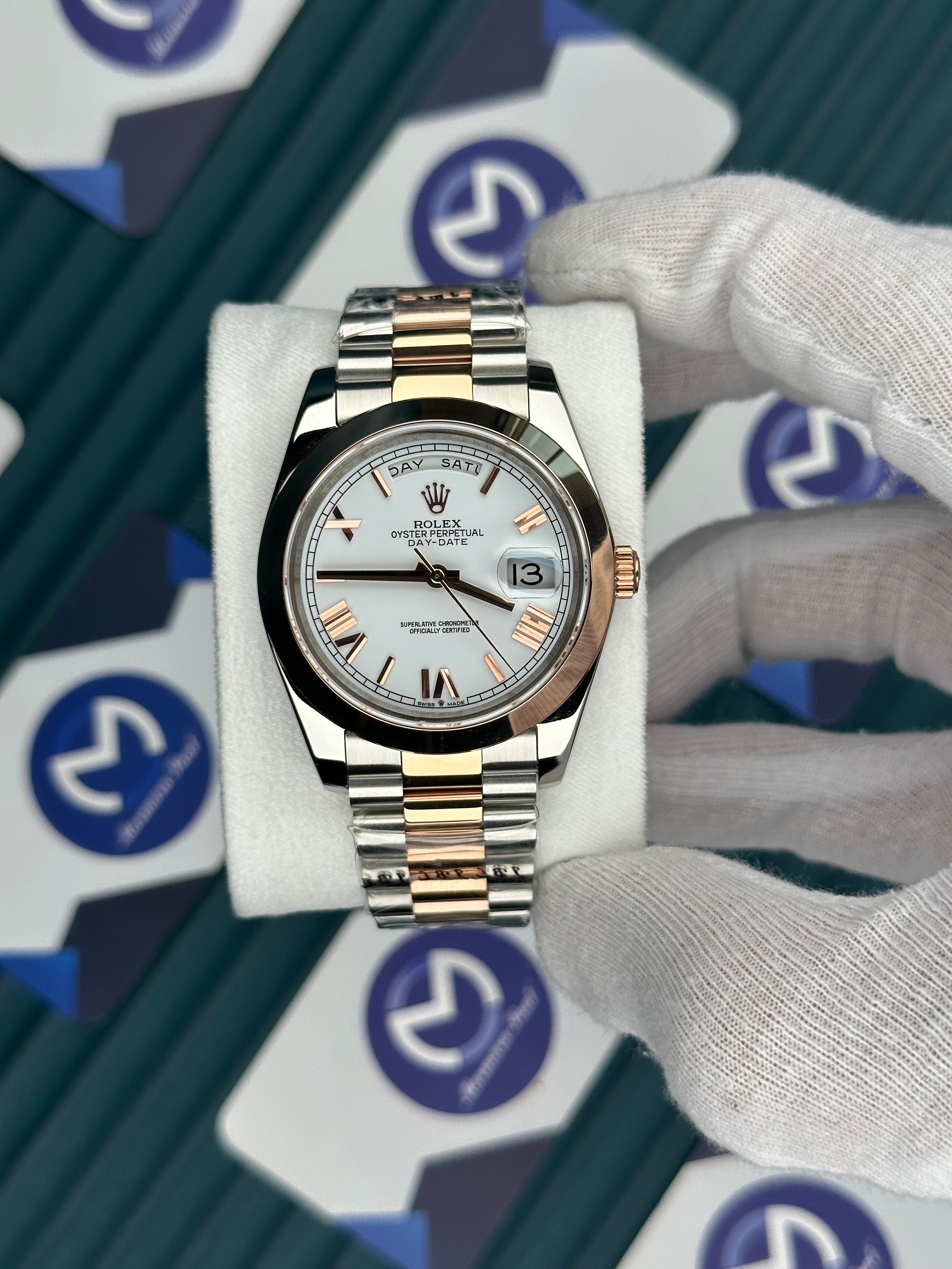 ROLEX DAY-DATE WHITE DIAL OVAL BEZEL ROMA INDEX ROSE-SILVER PRESIDENT