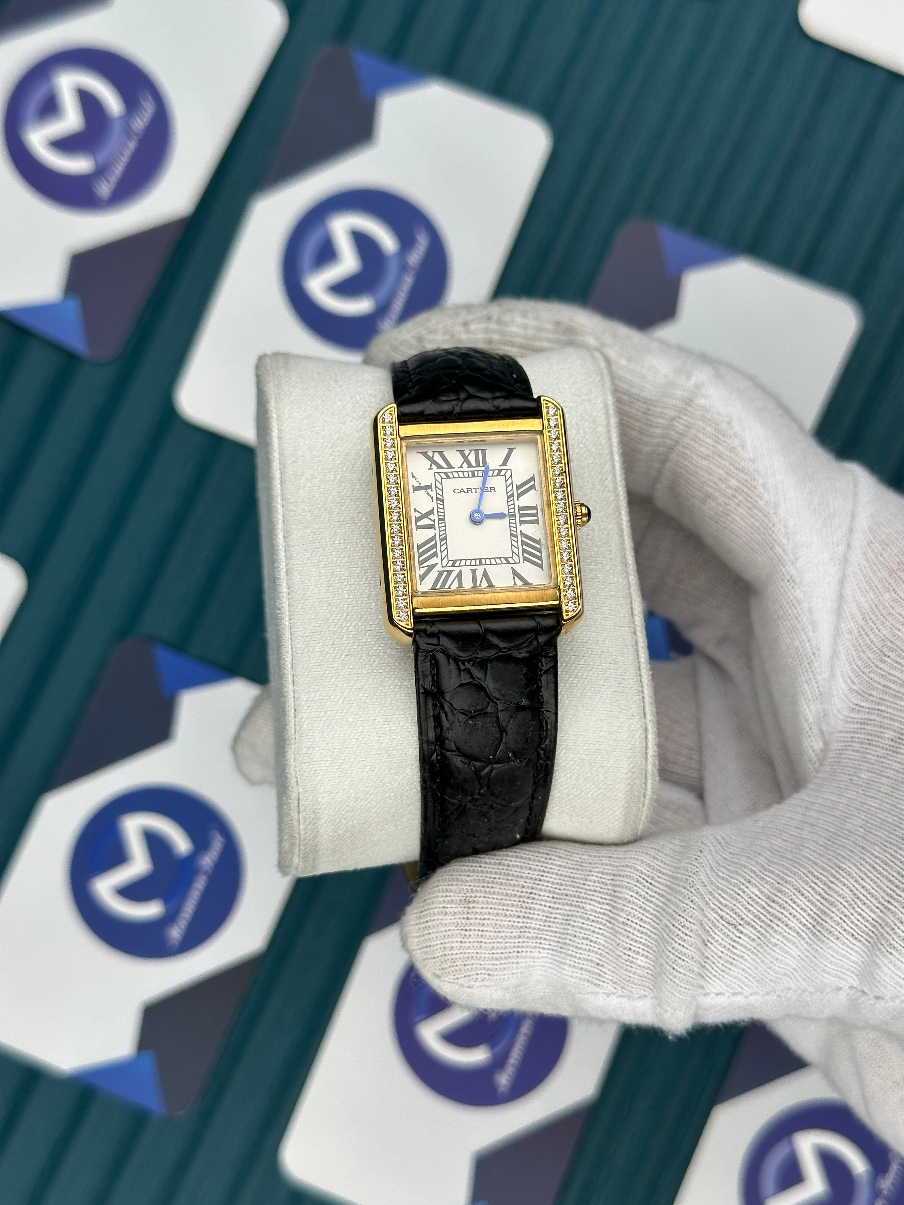 CARTIER WOMAN TANK WHITE DIAL GOLD DIAMOND BEZEL BLACK PATTERNED LEATHER