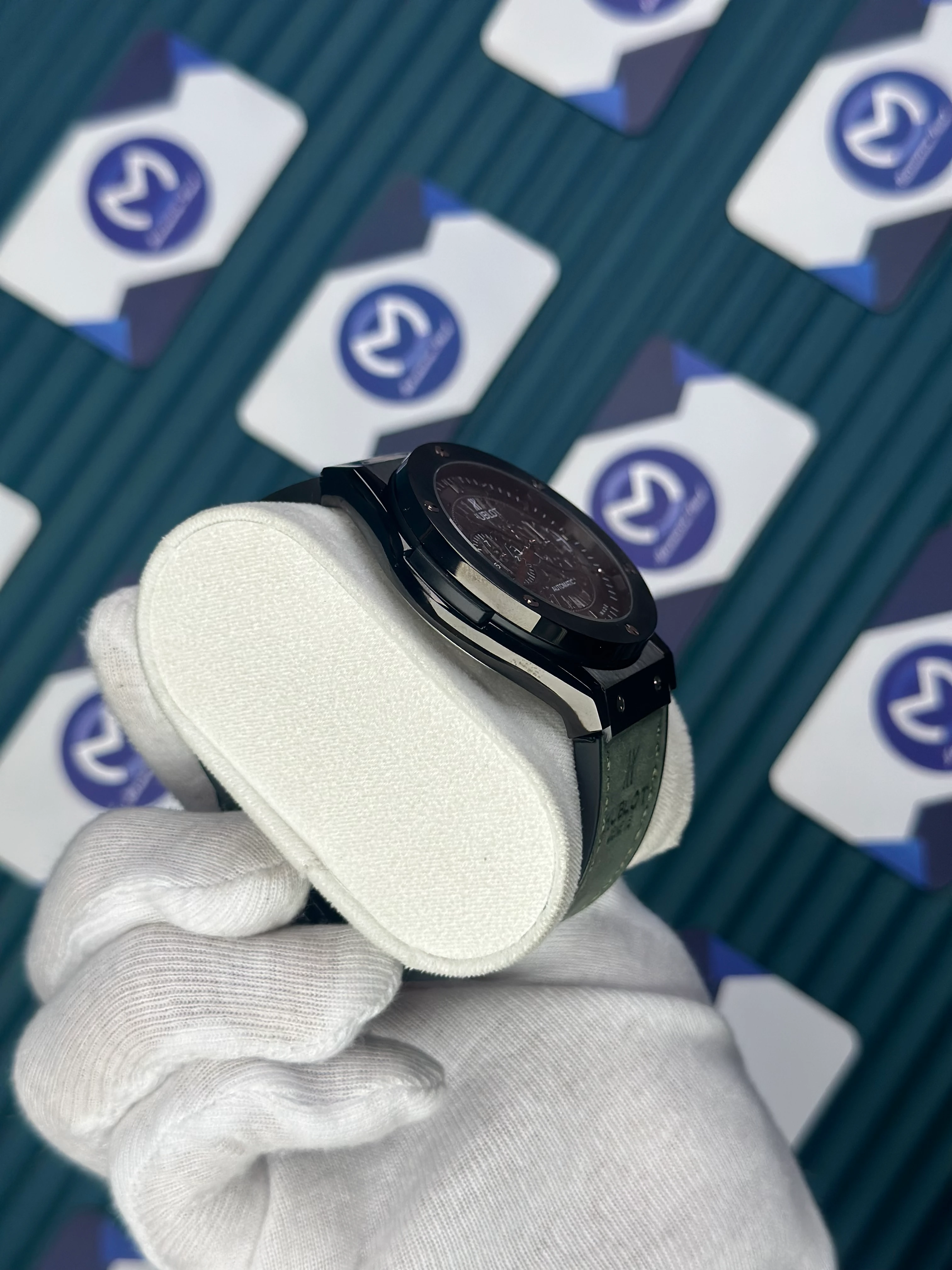 HUBLOT AUTOMATIC SKELETON DIAL BLACK CASE GREEN LEATHER CORD 