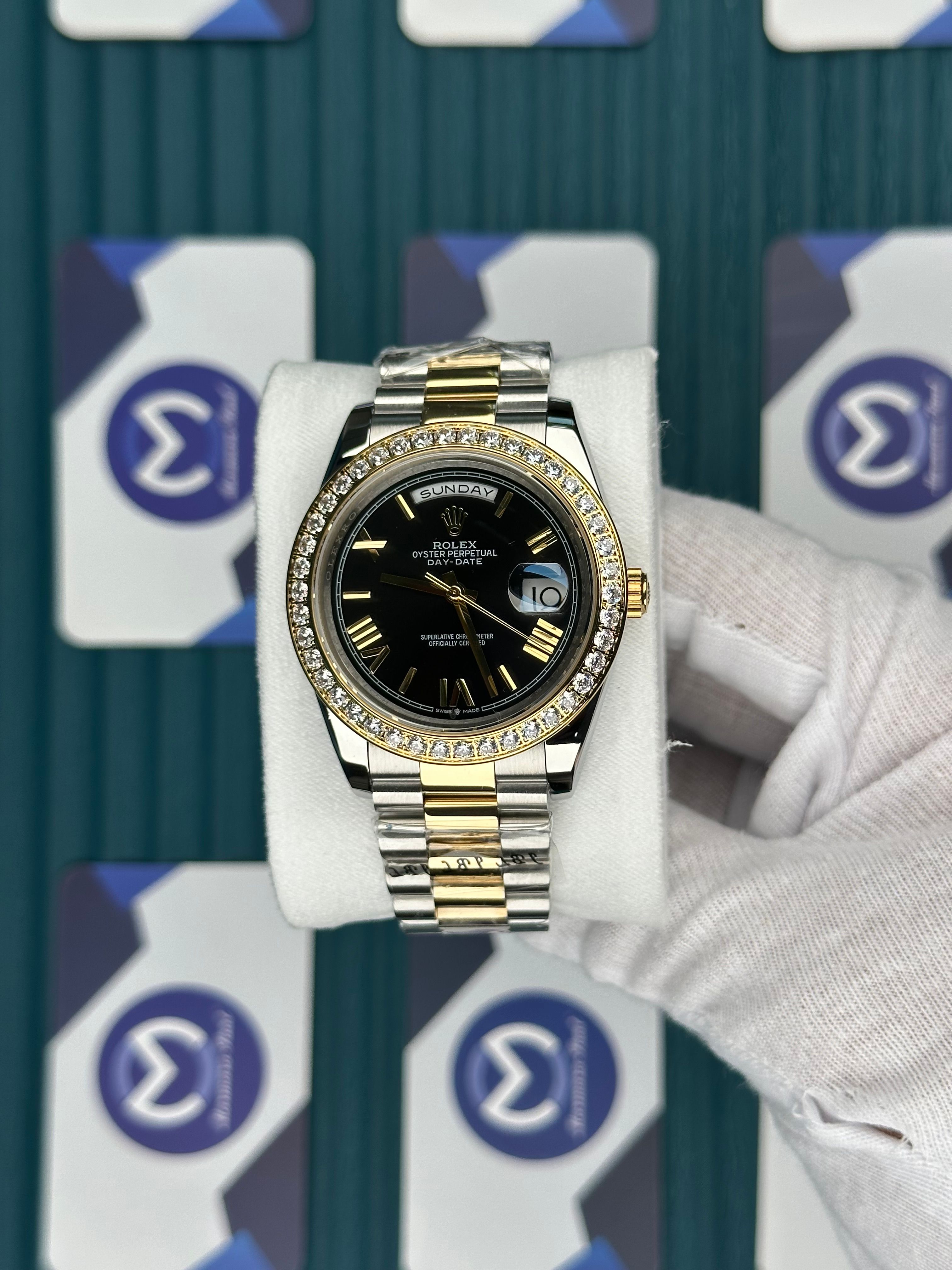 ROLEX DAY-DATE BLACK DIAL ROMA INDEX DIAMOND BEZEL GOLD-SILVER PRESIDENT