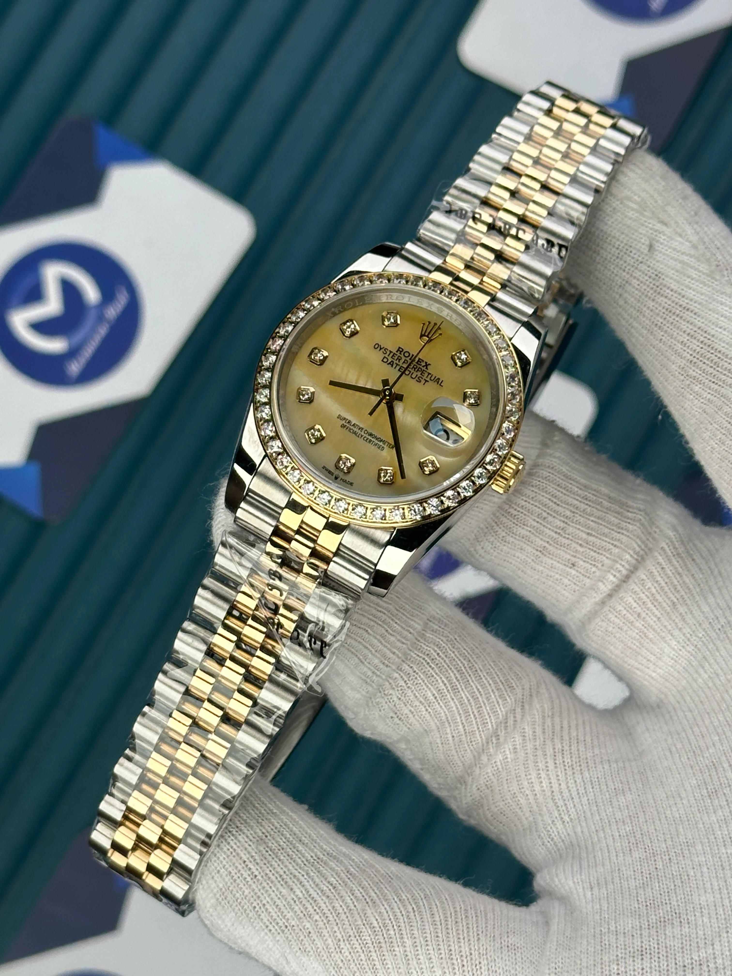 ROLEX 36 MM DATEJUST CHAMPAGNE DIAL DIAMOND INDEX AND BEZEL GOLD-SILVER JUBILE 