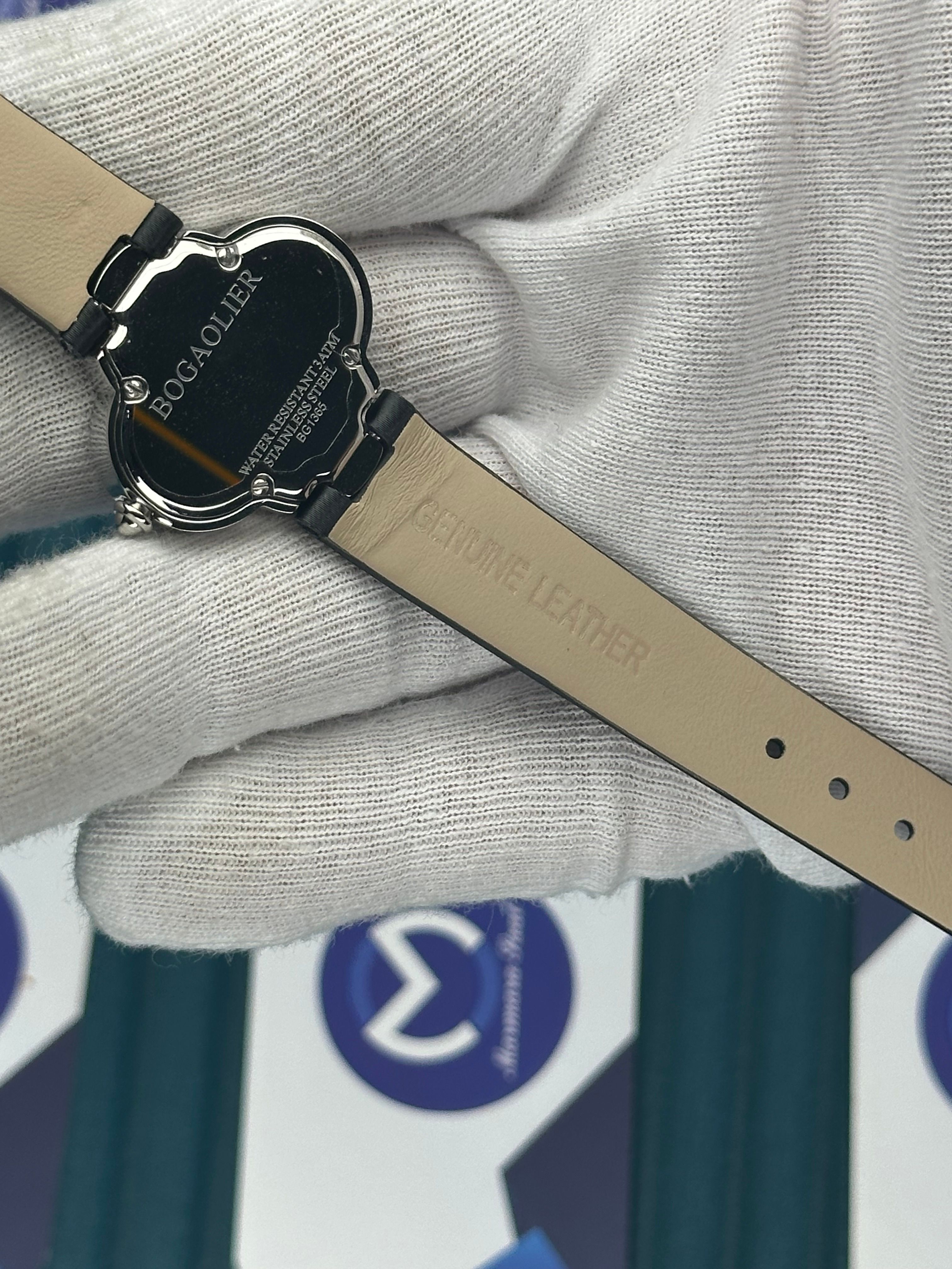 VAN CLEEF & ARPELS WHITE DIAL DIAMOND BEZEL SILVER CASE BLACK LEATHER CORD