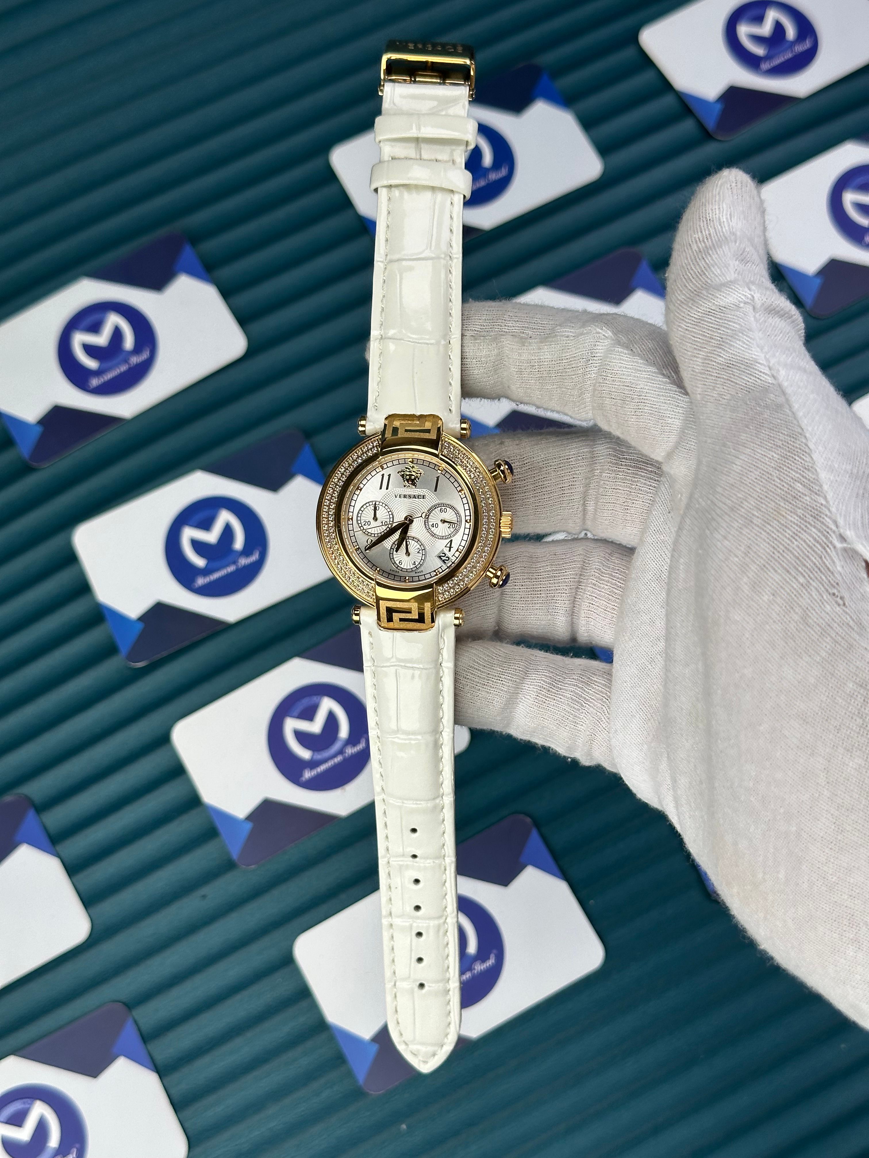 VERSACE 38 WHITE DIAL GOLD CASE DIAMOND BEZEL CHRONOGRAPH WHITE LEATHER CORD