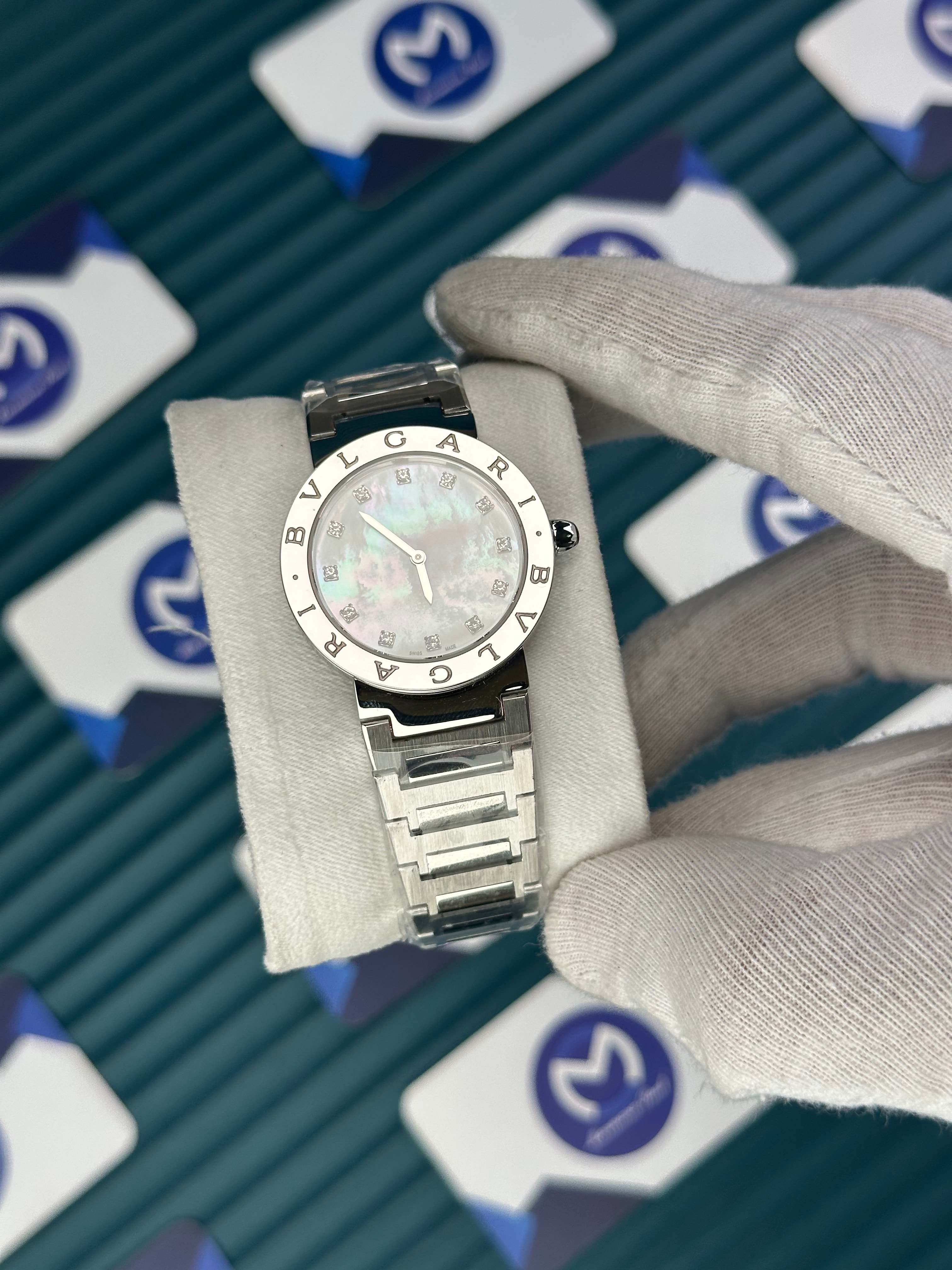 BVLGARI PEARLESCENT WHITE DIAL SILVER BEZEL DIAMOND INDEX SILVER CORD