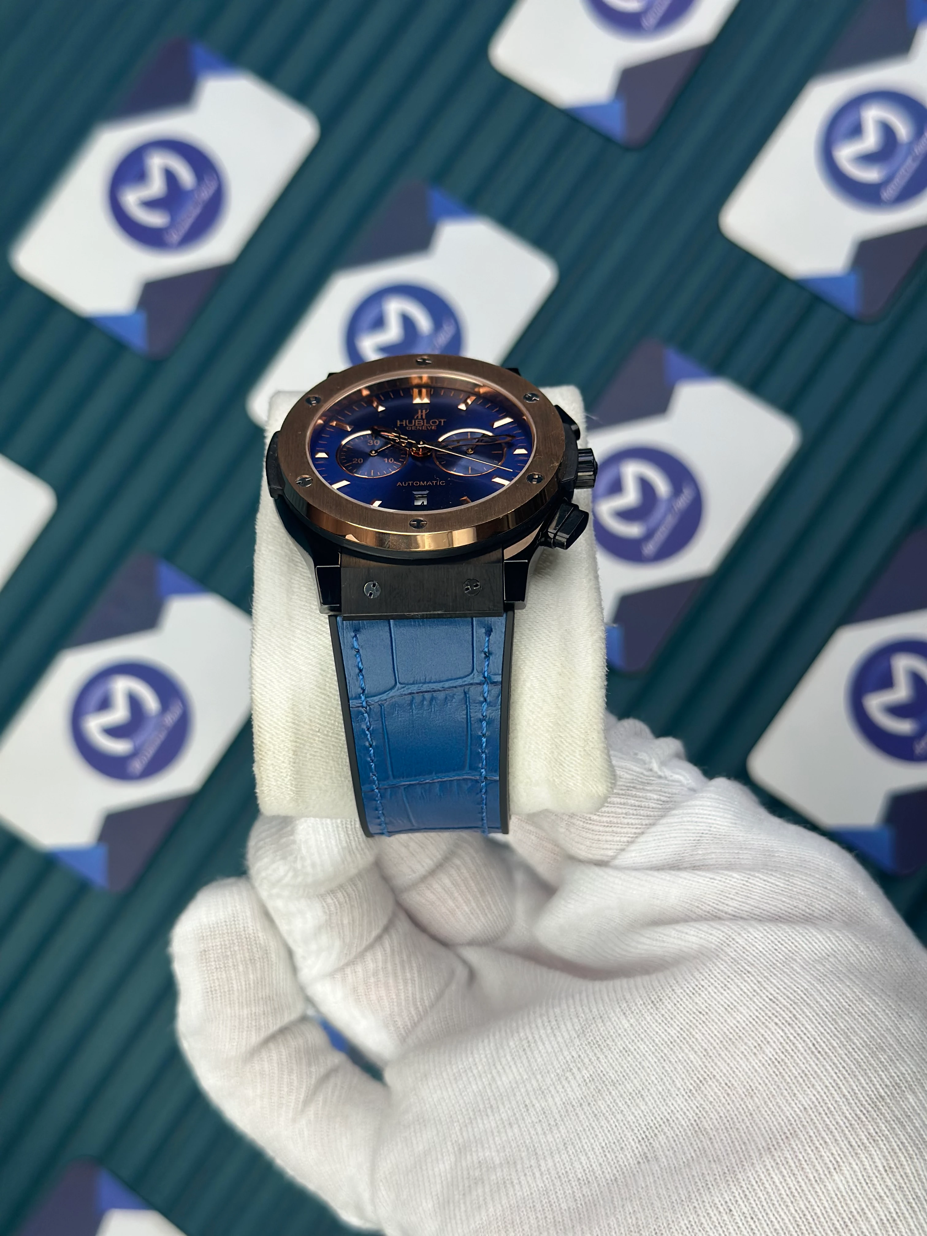 HUBLOT AUTOMATIC NAVY BLUE CHRONOGRAPH ROSE CASE BLACK CASE BLUE LEATHER CORD 