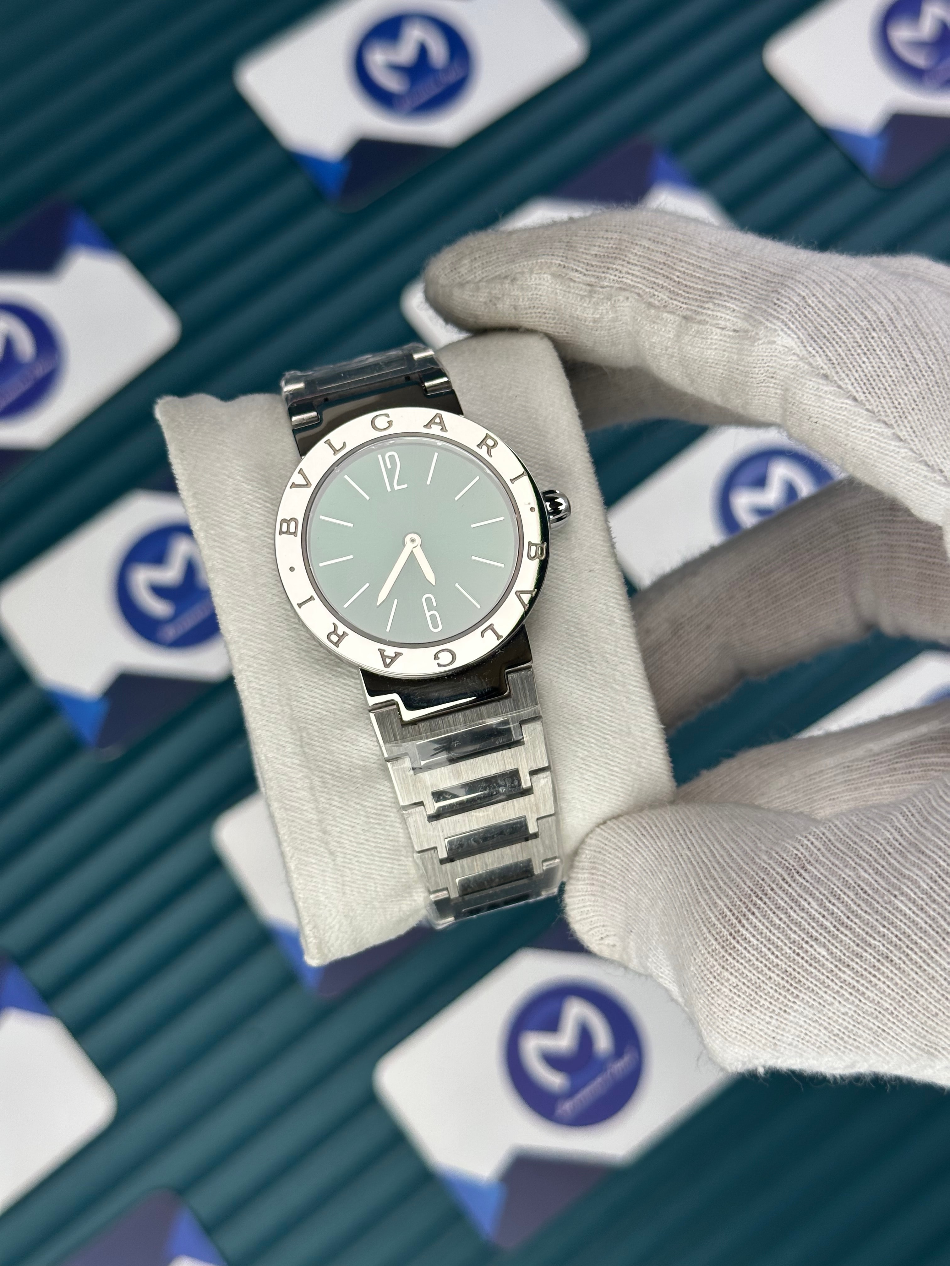 BVLGARI GREEN DIAL SILVER BEZEL SILVER CORD