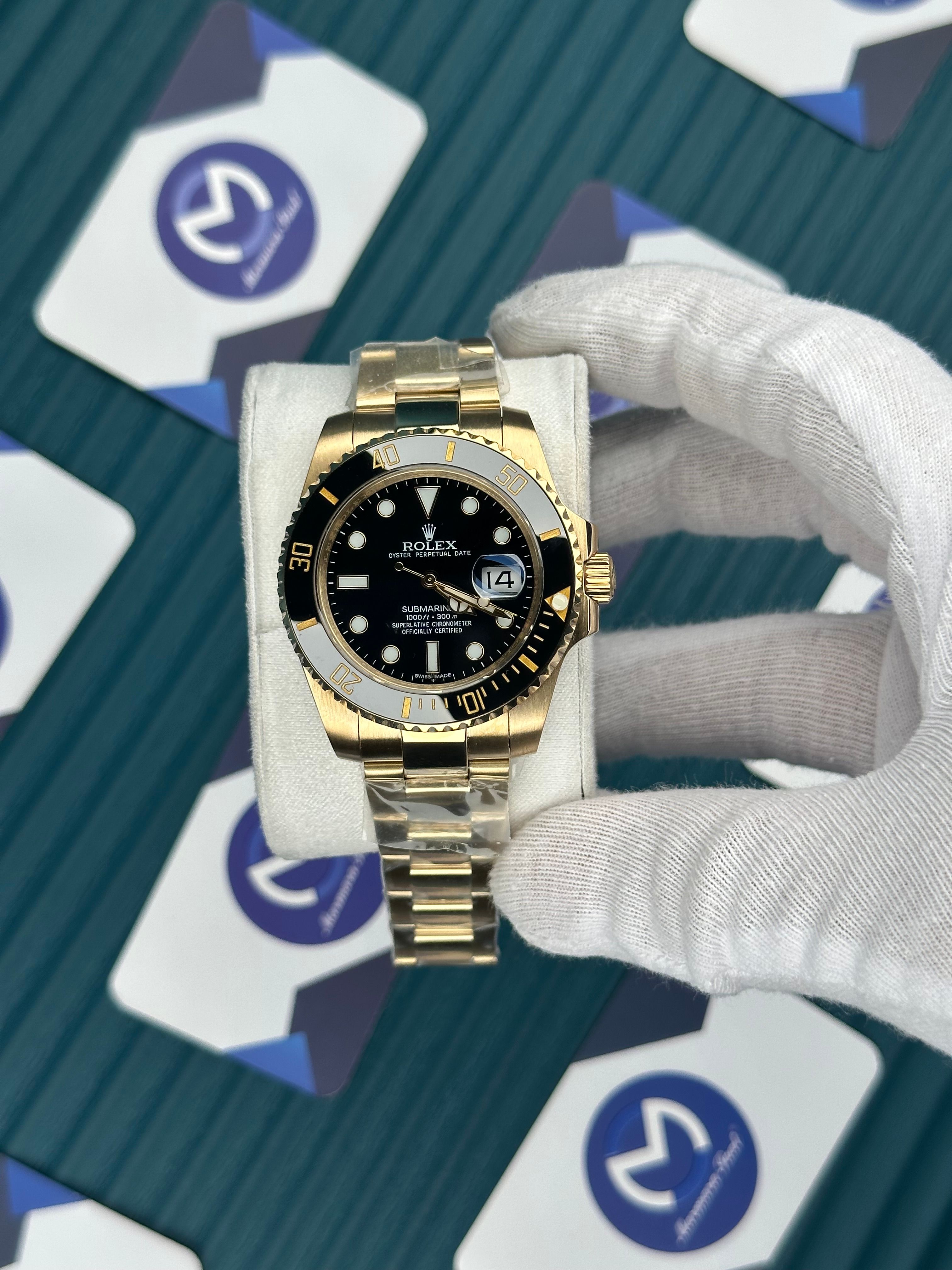ROLEX SUBMARINER NLACK DIAL GOLD OYSTER