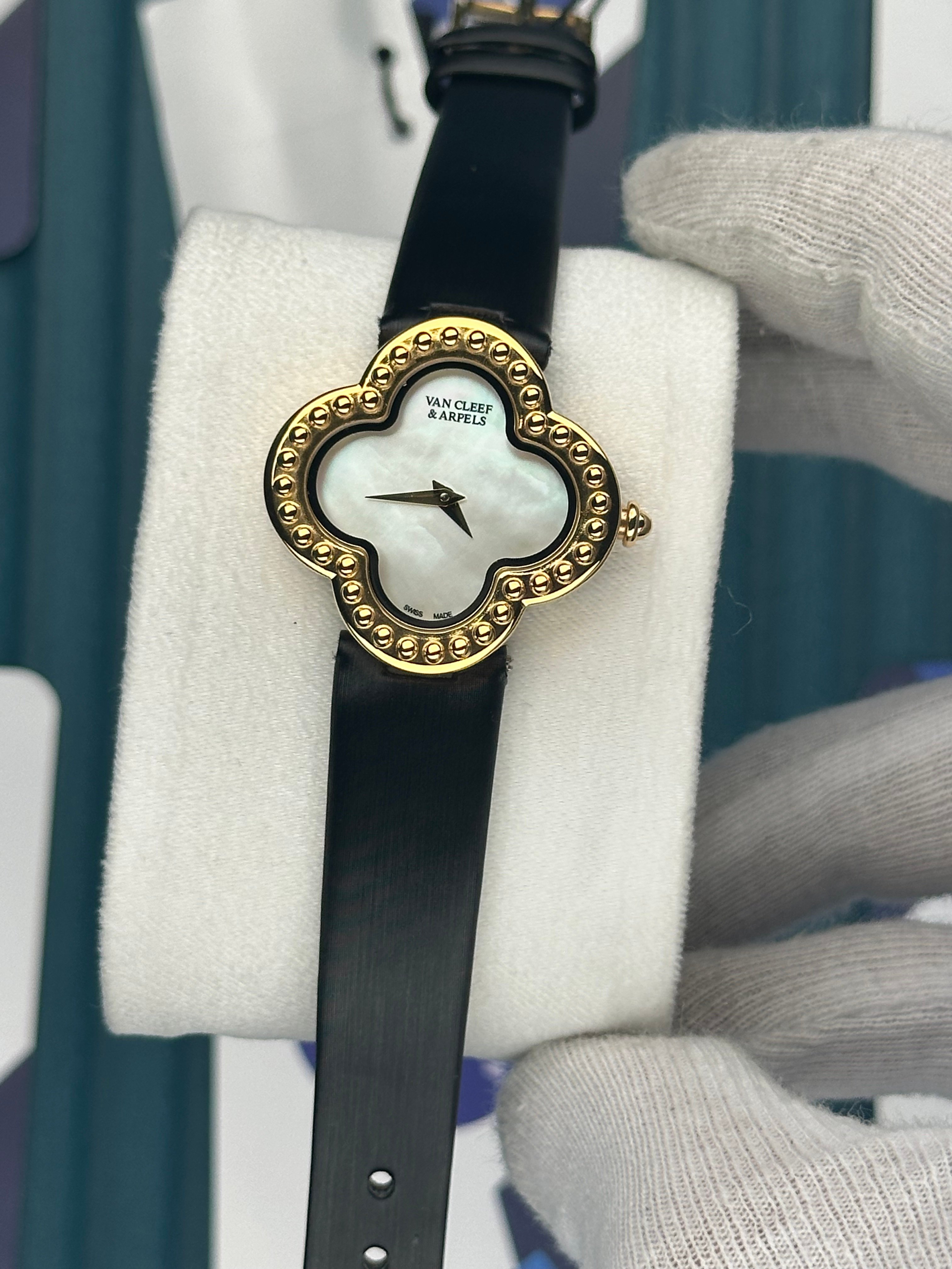 VAN CLEEF & ARPELS WHITE DIAL GOLD CASE BLACK LEATHER CORD