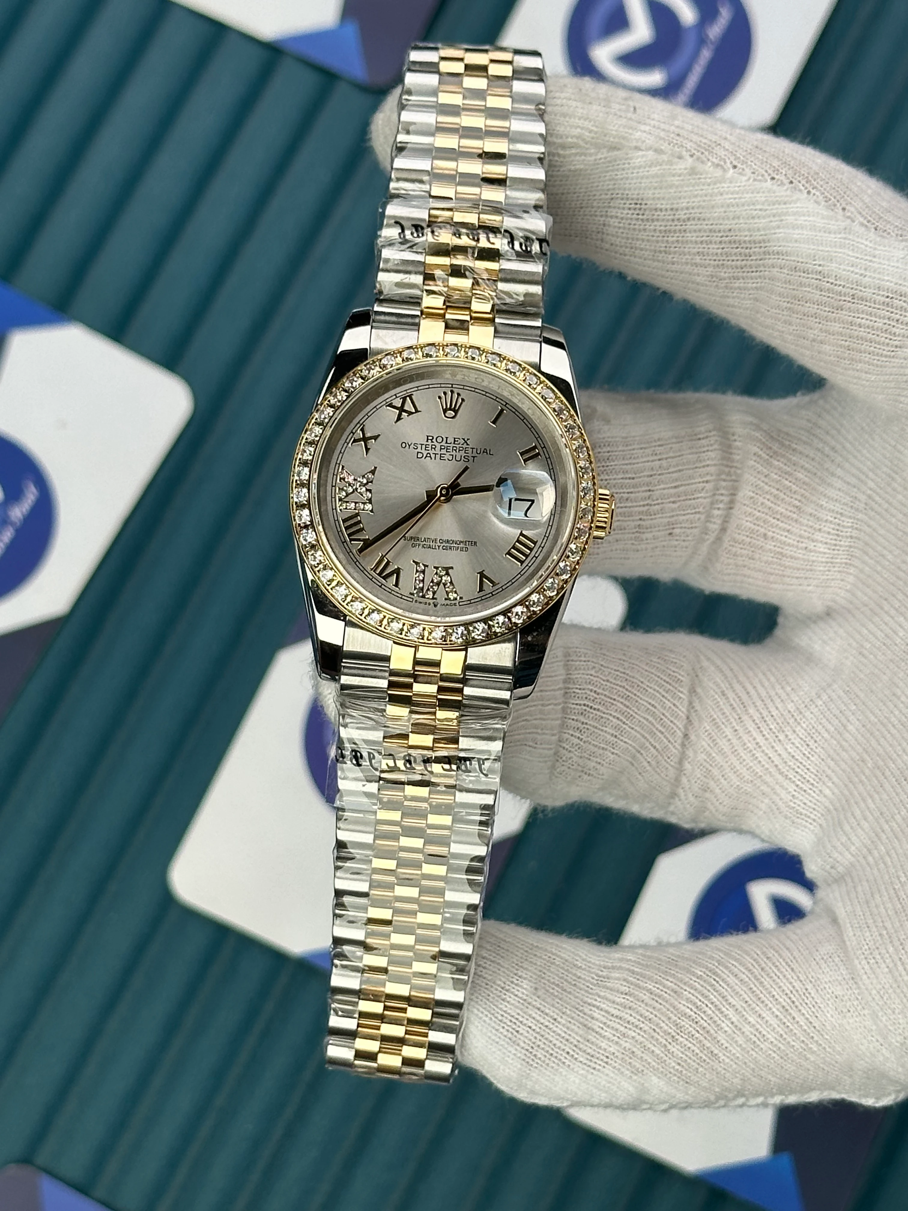 ROLEX 36 MM DATEJUST OFF WHITE DIAL DIAMOND ROMA INDEX DIAMOND BEZEL GOLD-SILVER JUBILE 