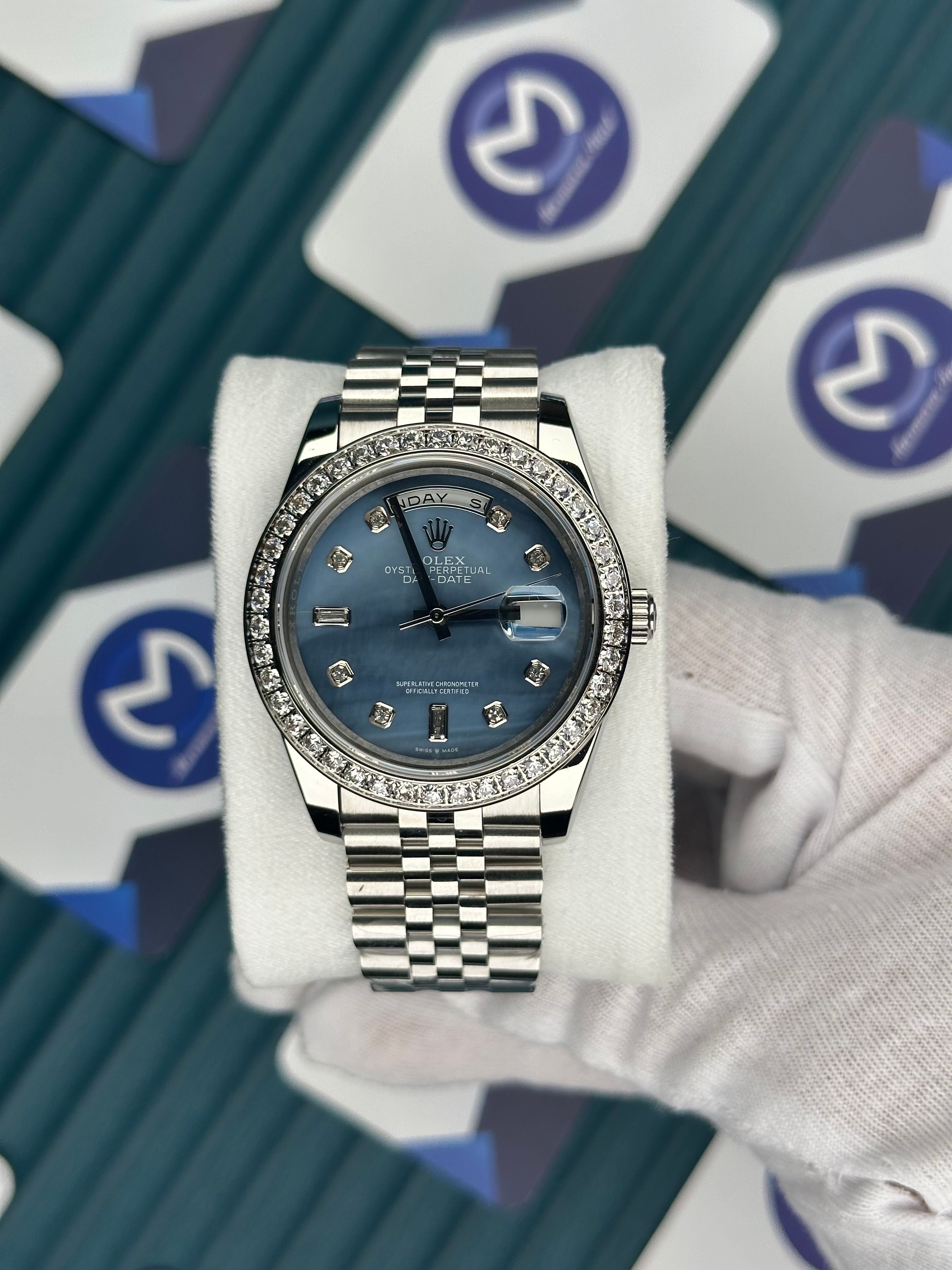 ROLEX DAY-DATE PATTERNED BLUE DIAMOND BEZEL AND INDEX SILVER JUBILE