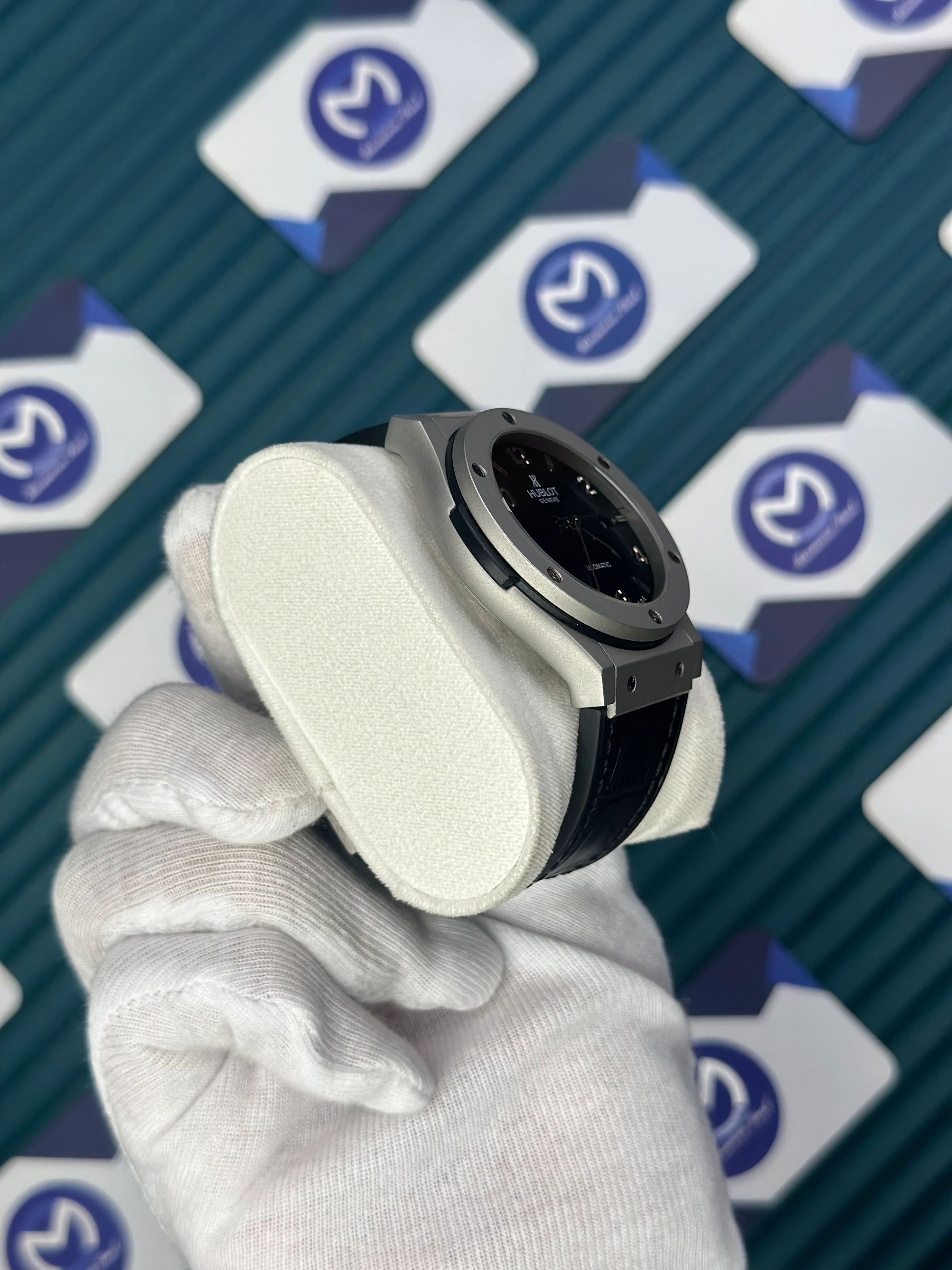 HUBLOT GENEVE AUTOMATIC BLACK DIAL GREY CASE BLACK LEATHER CORD 