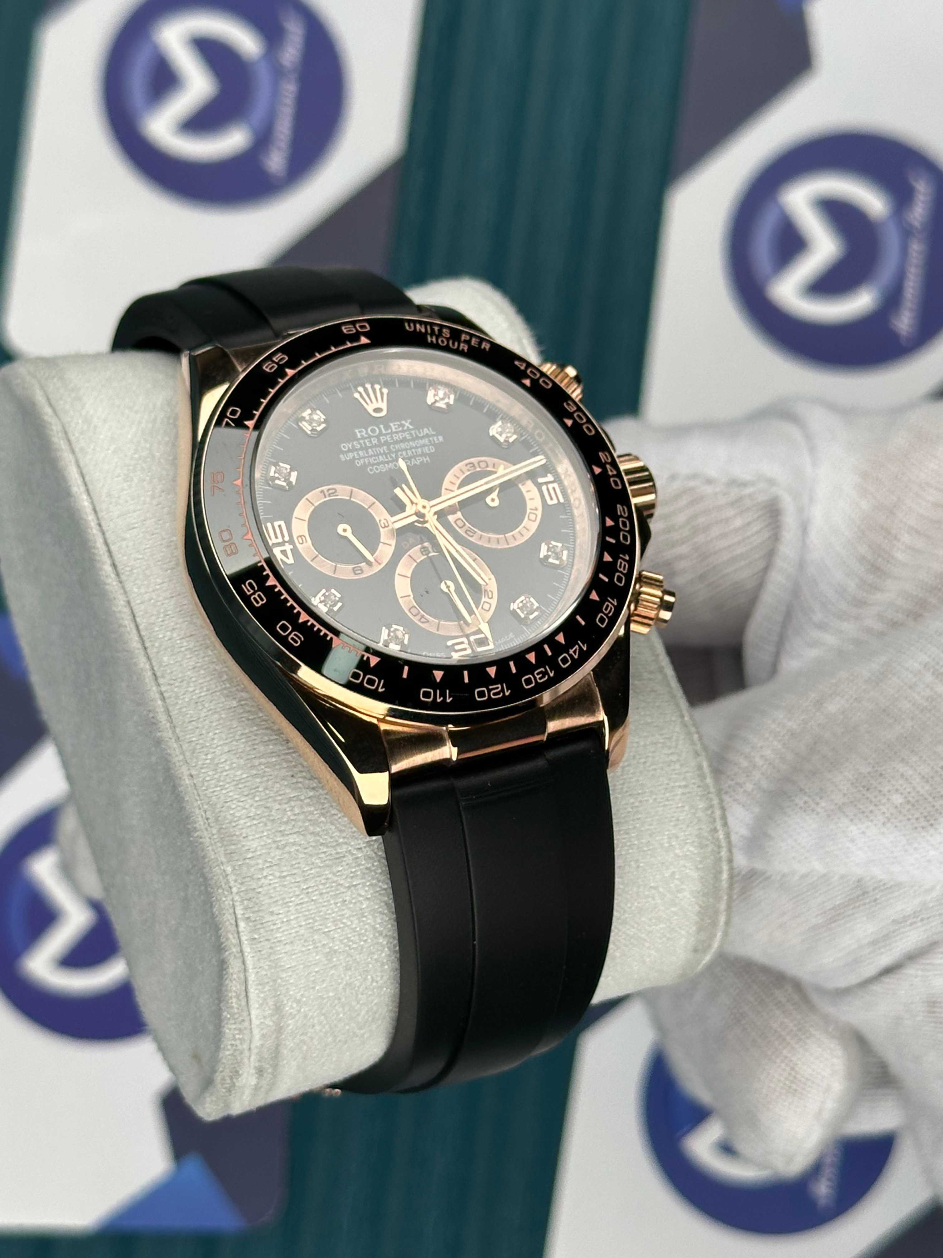 ROLEX DAYTONA BLACK DIAL DIAMOND INDEX ROSE CASE OYSTERFLEX